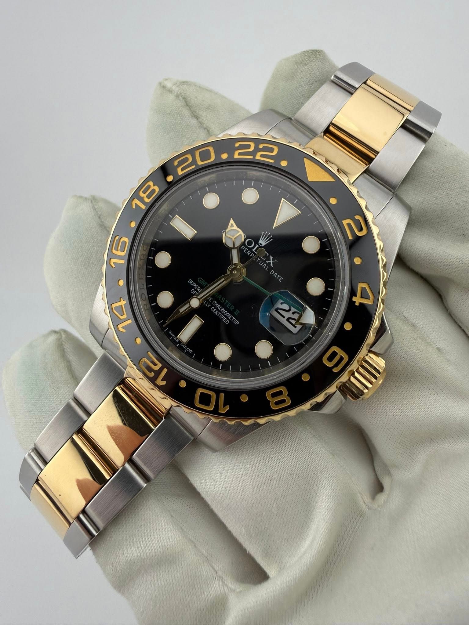 May be an image of wrist watch and text