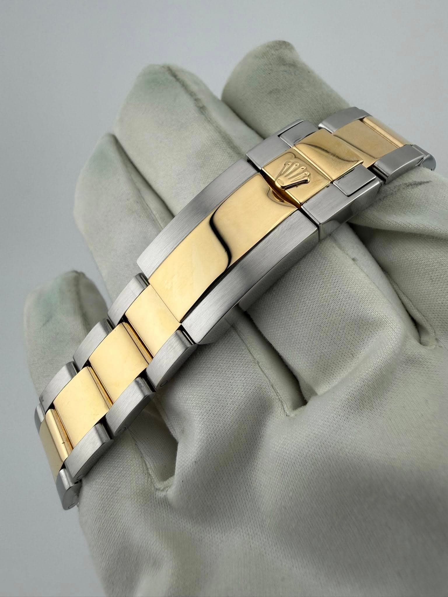 May be an image of wrist watch and jewelry