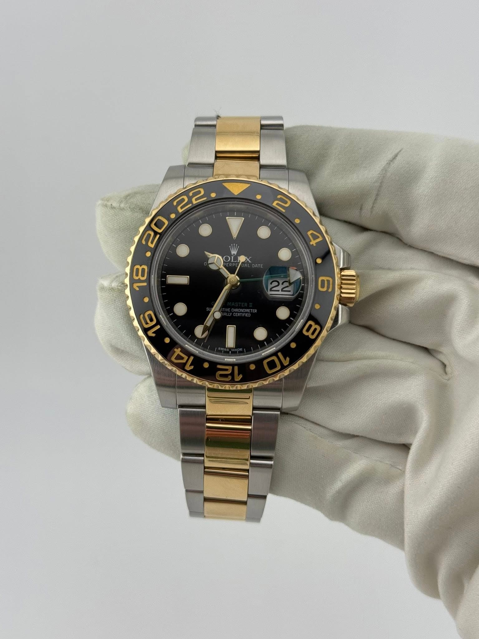 May be an image of wrist watch and text