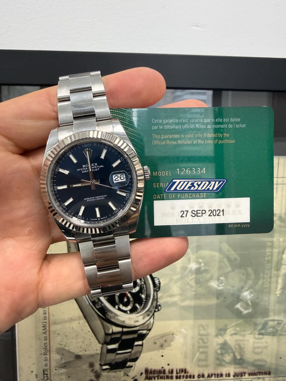 May be an image of wrist watch and text