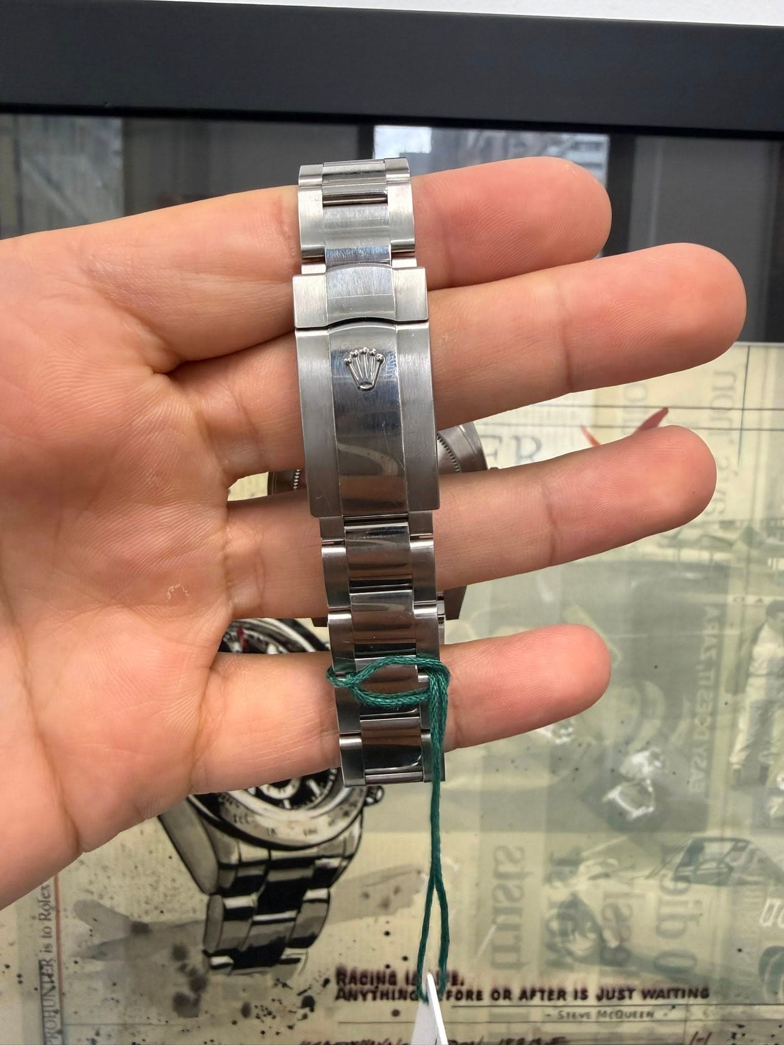May be an image of wrist watch and text