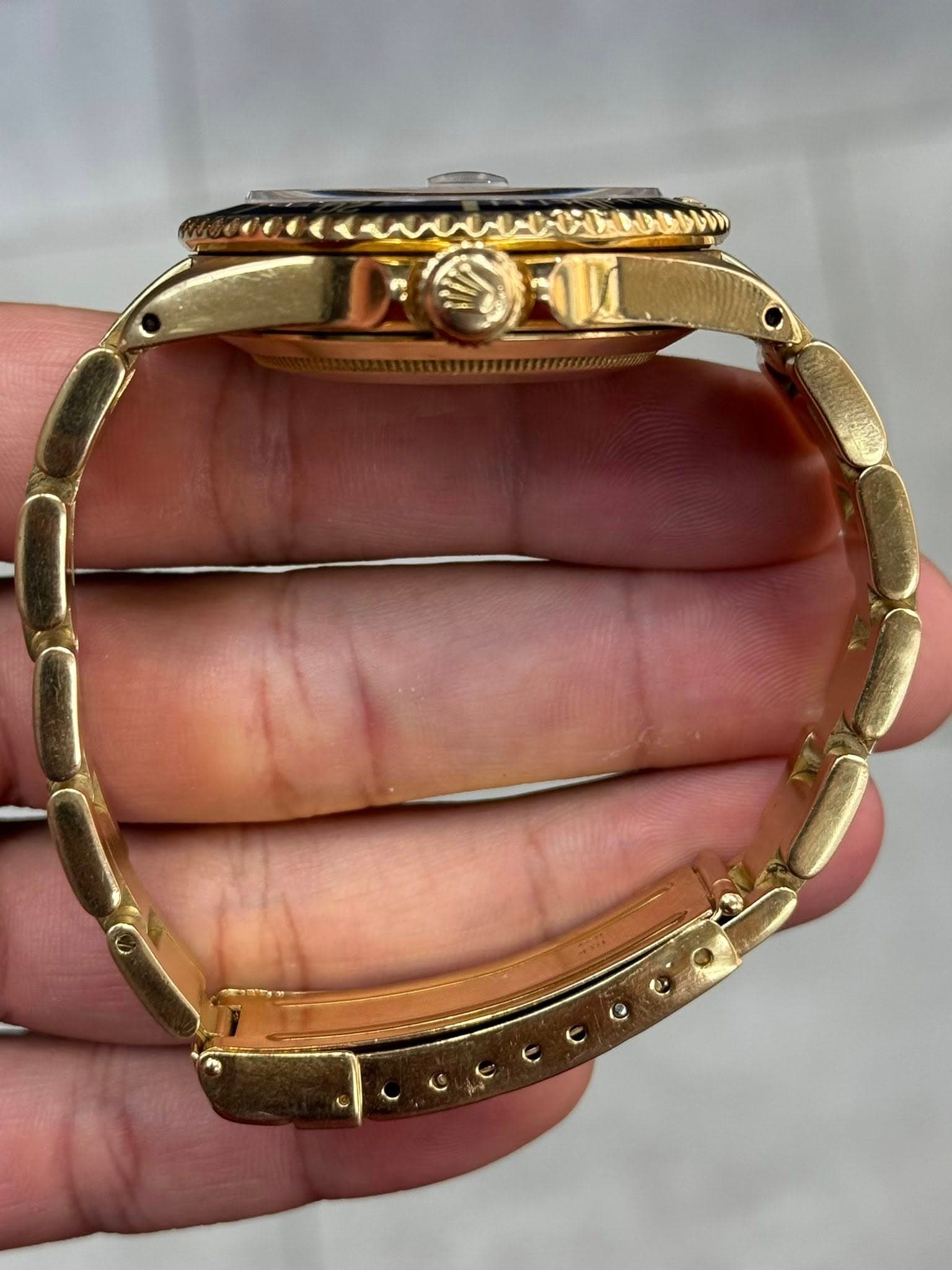 May be an image of wrist watch