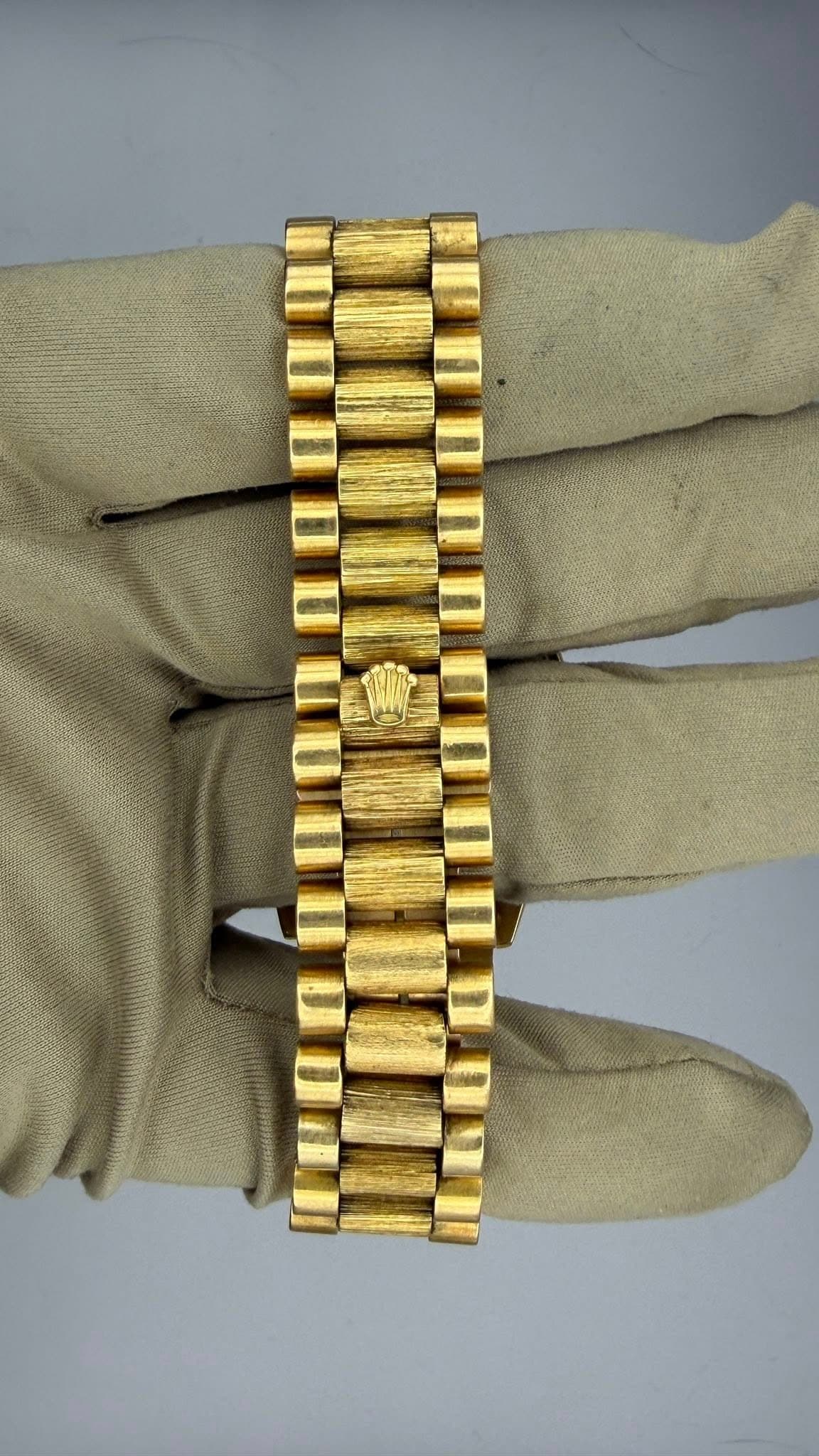 May be an image of jewelry and wrist watch