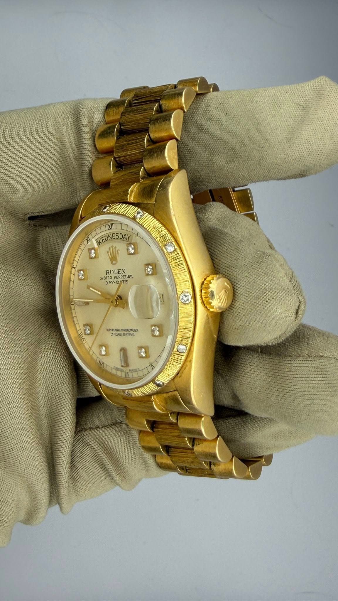 May be an image of wrist watch and text