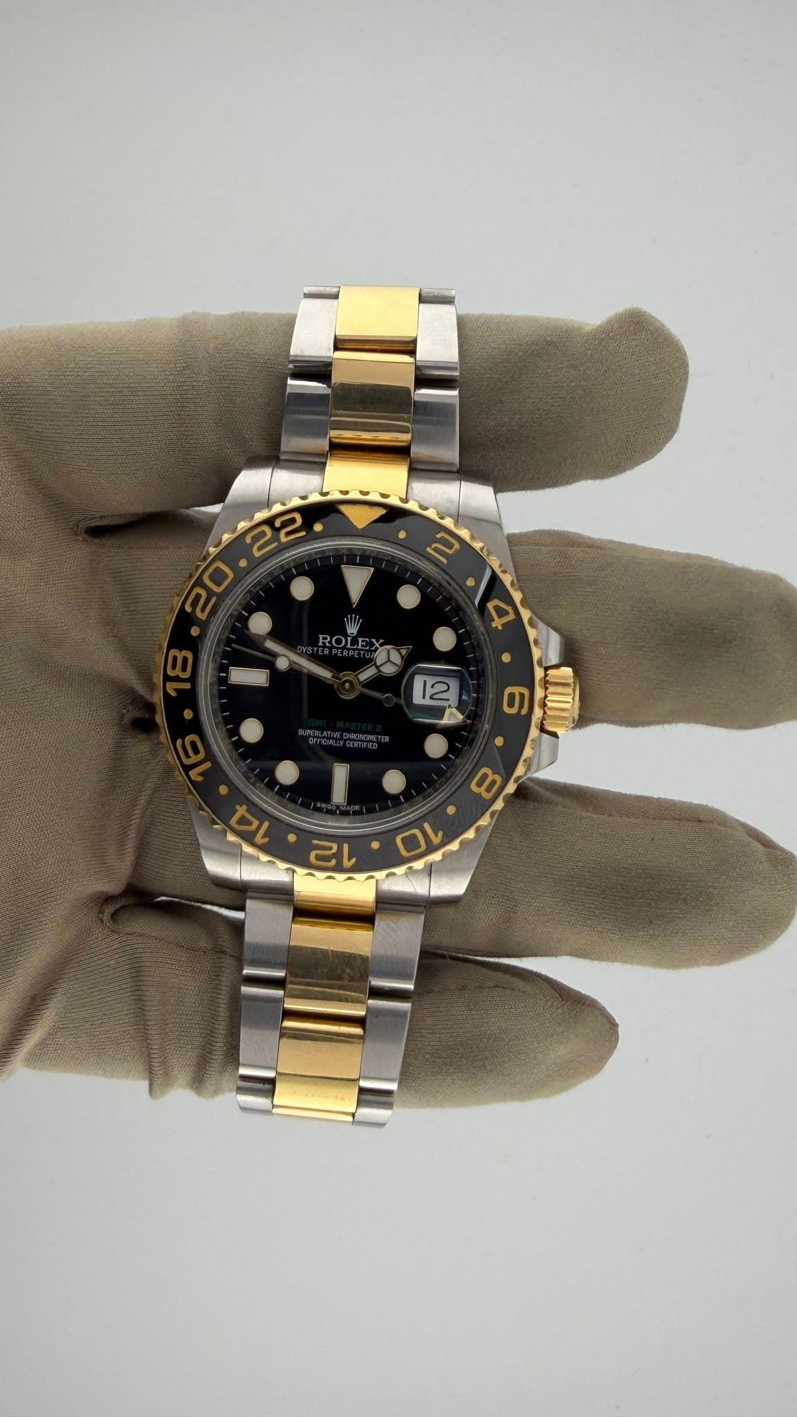 May be an image of wrist watch and text
