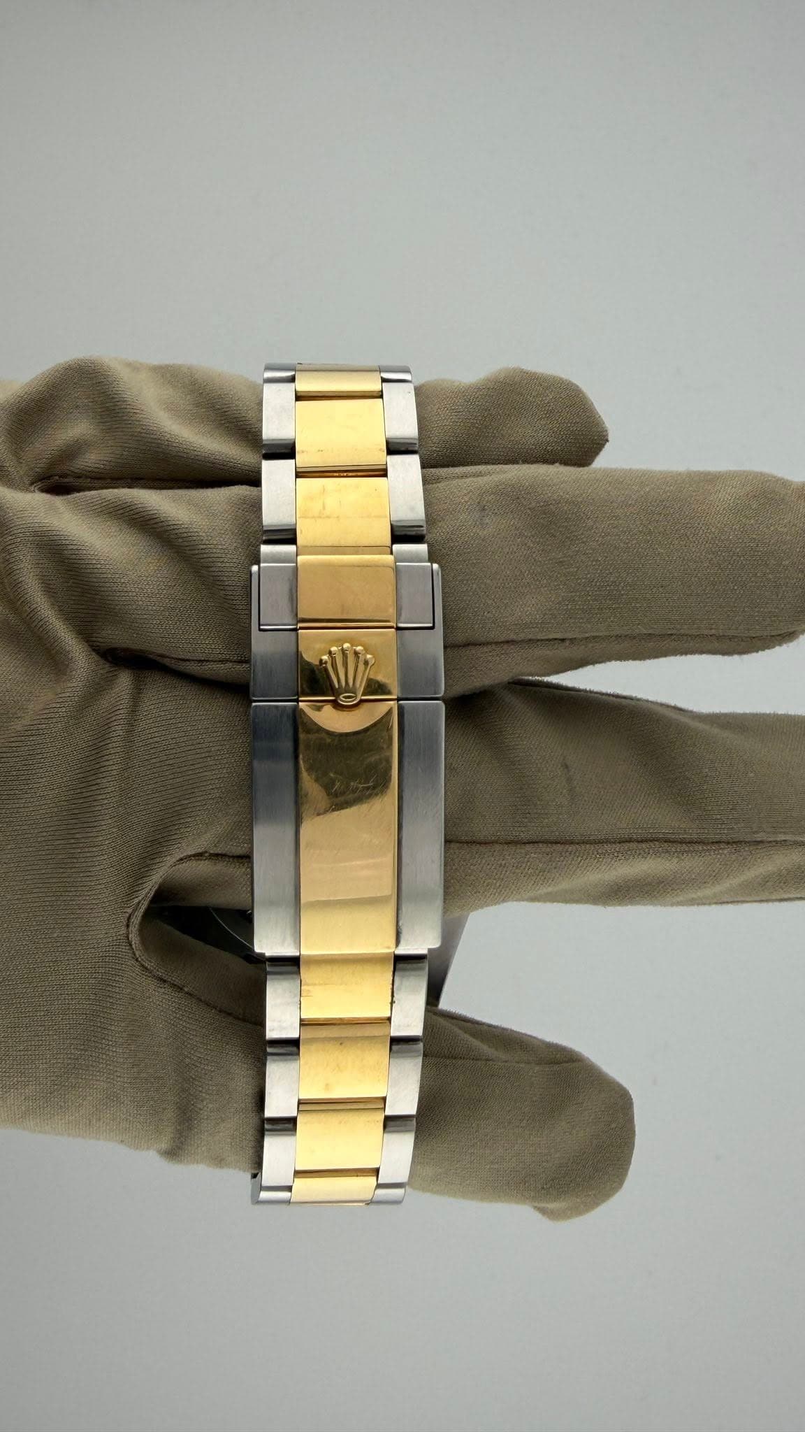 May be an image of wrist watch and jewelry