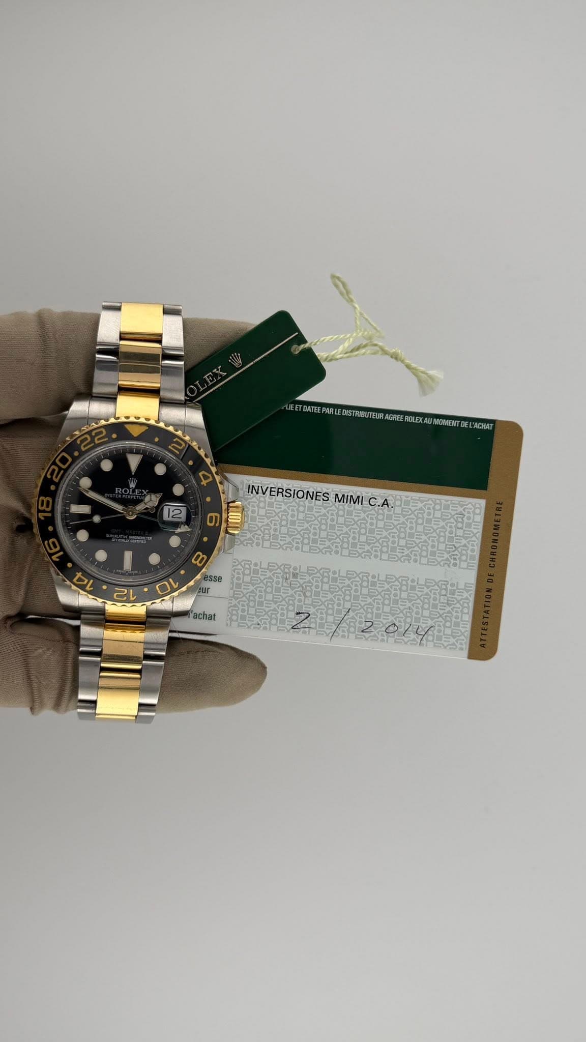 May be an image of wrist watch and text