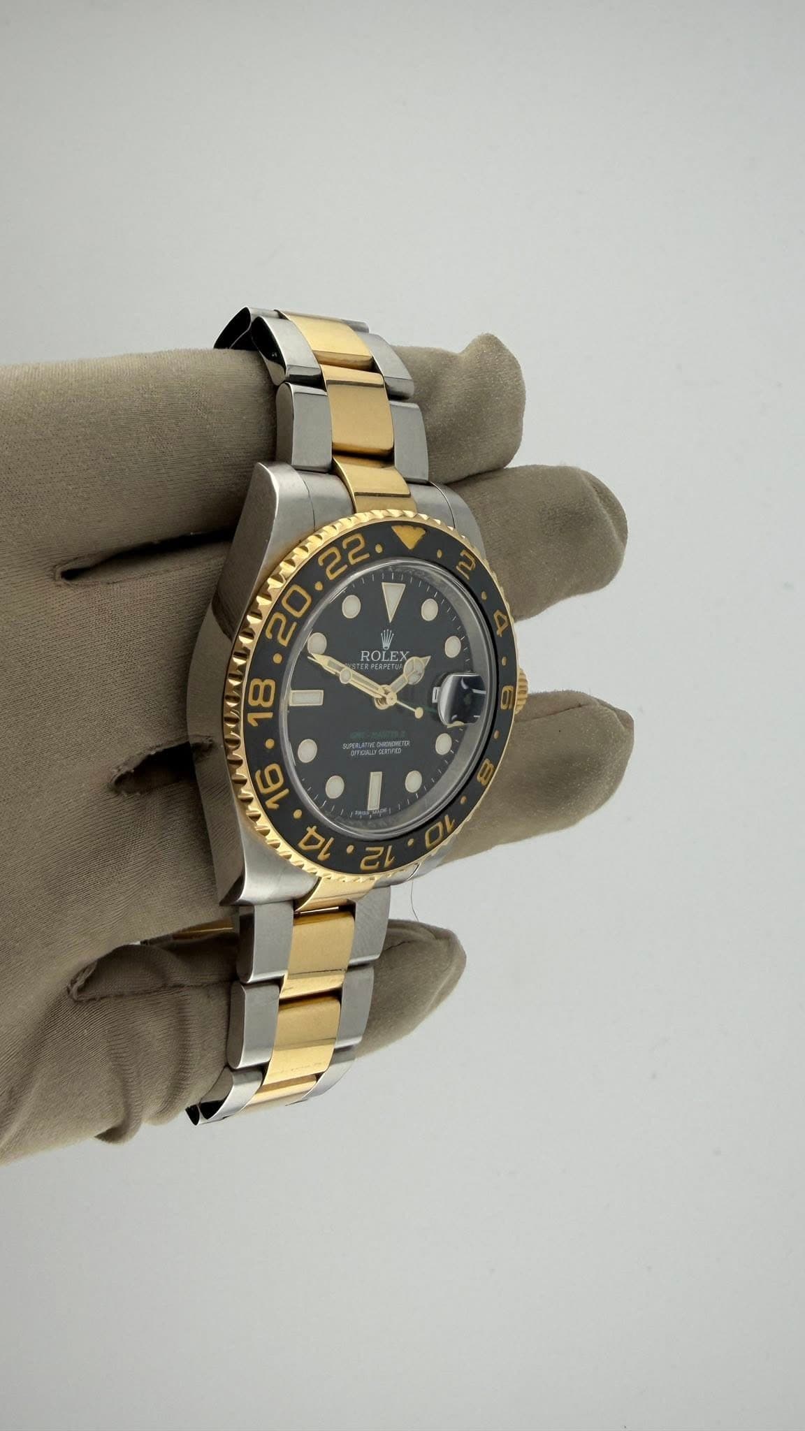 May be an image of wrist watch and text