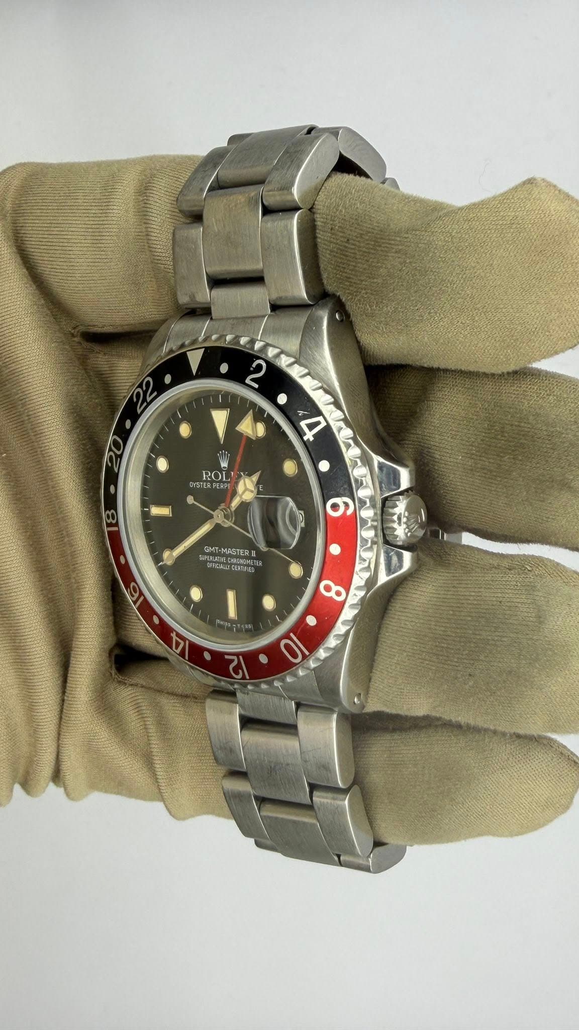 May be an image of wrist watch and text