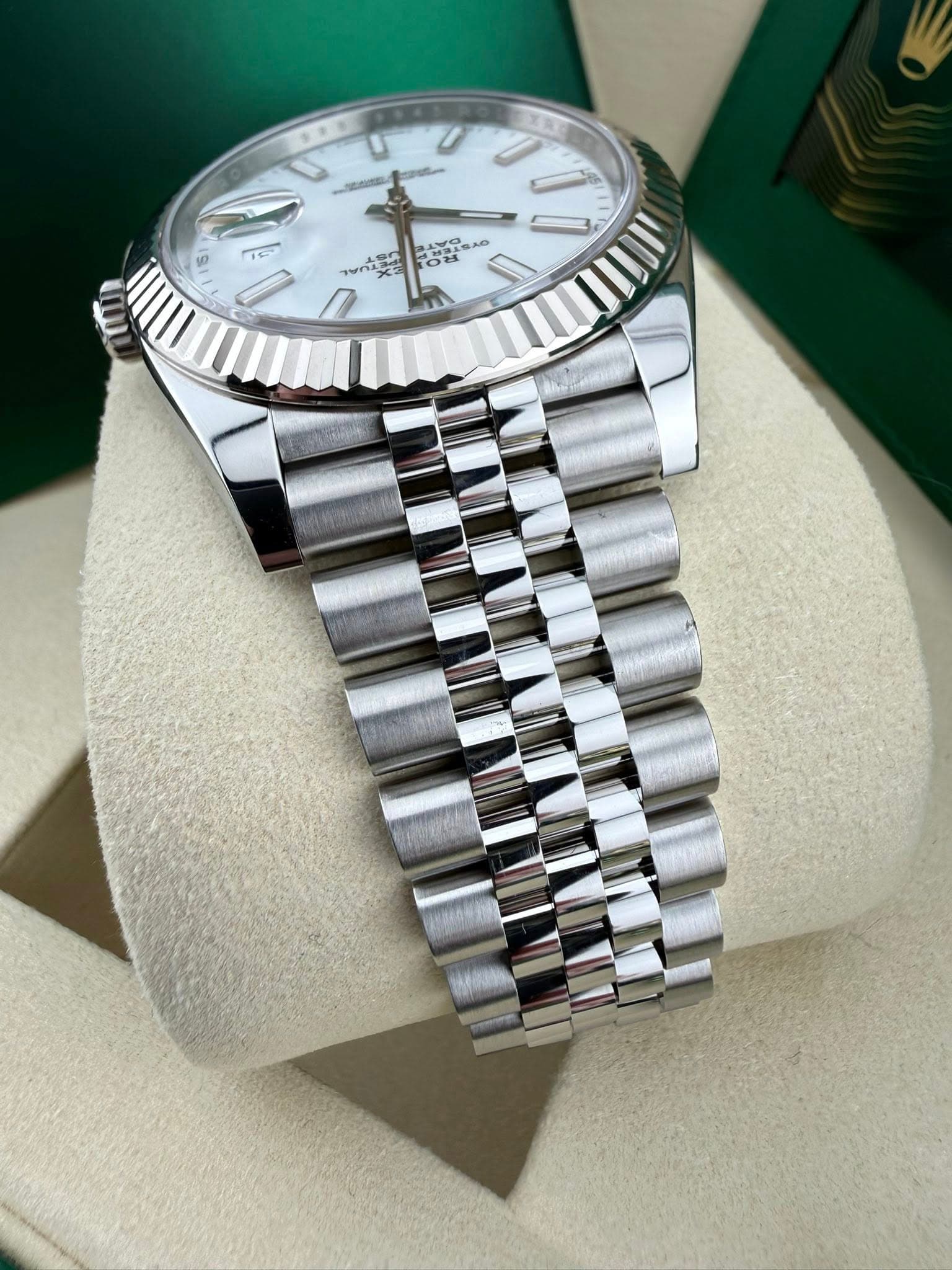 May be an image of wrist watch and text