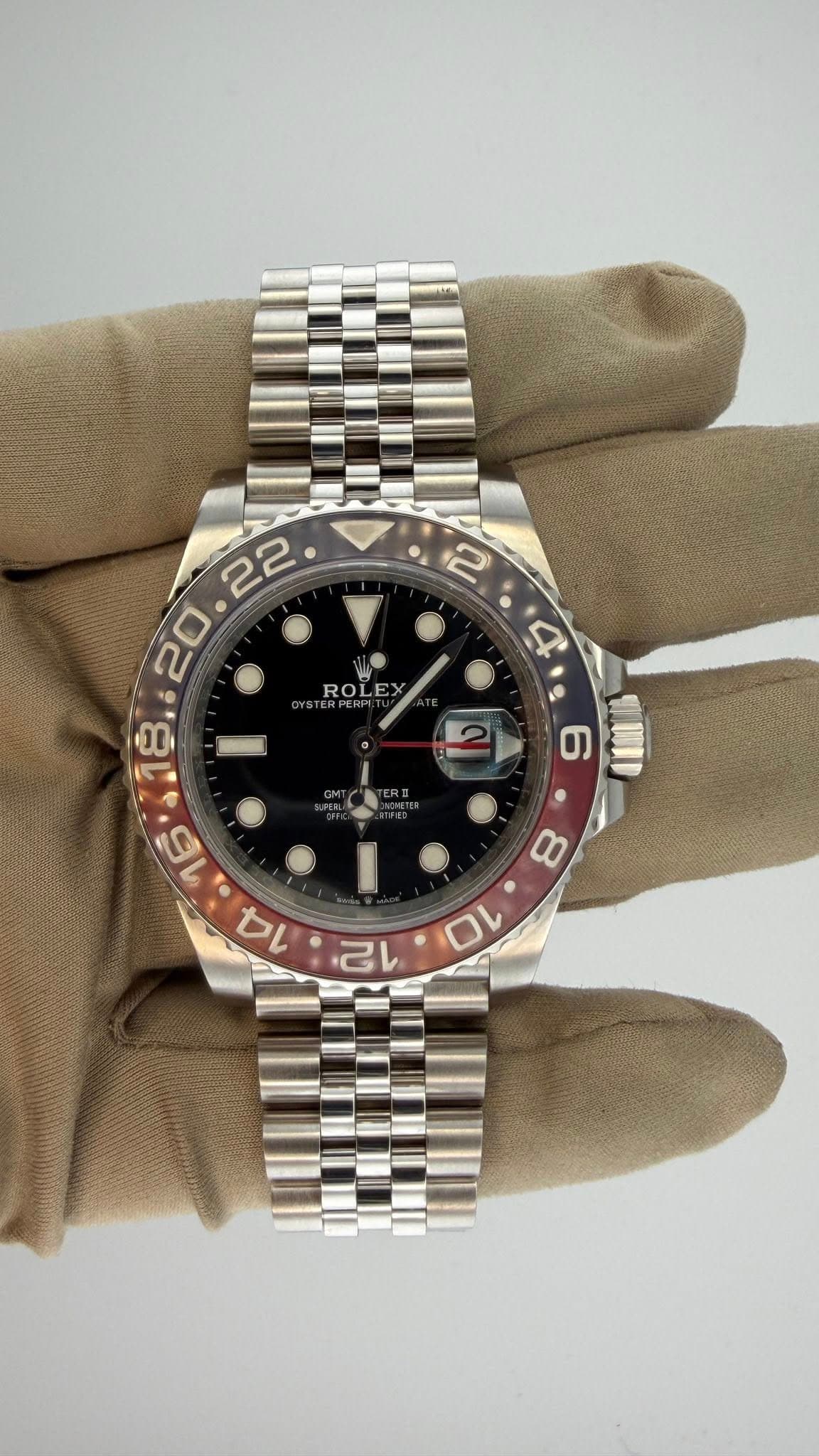 May be an image of wrist watch and text