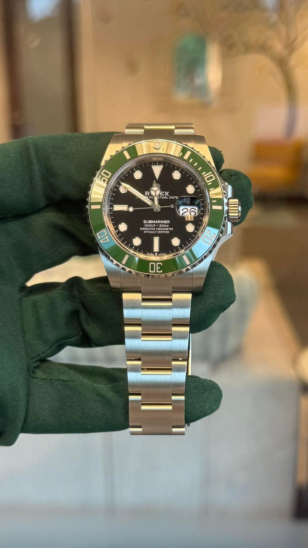 May be an image of wrist watch and text