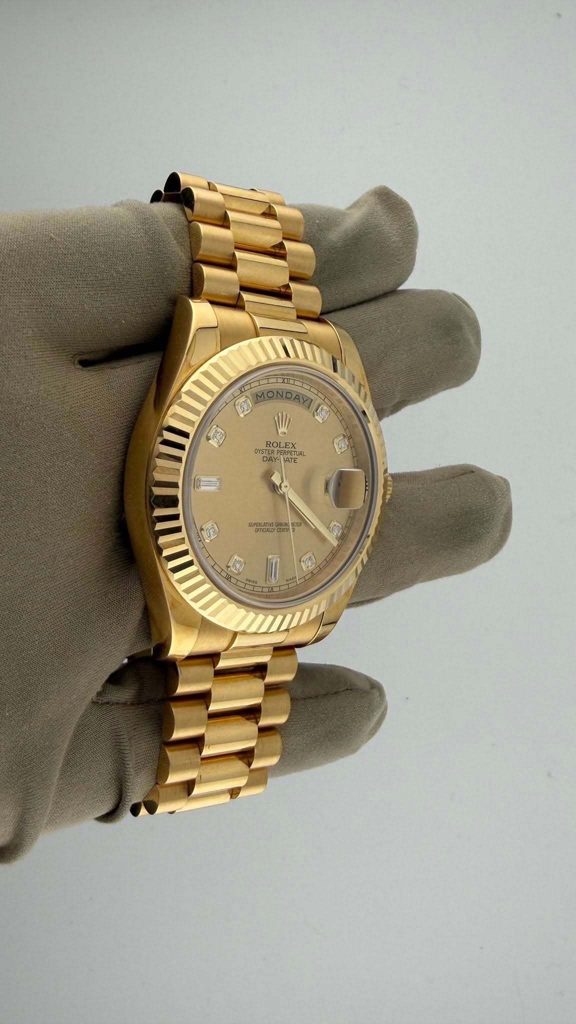 May be an image of wrist watch and text