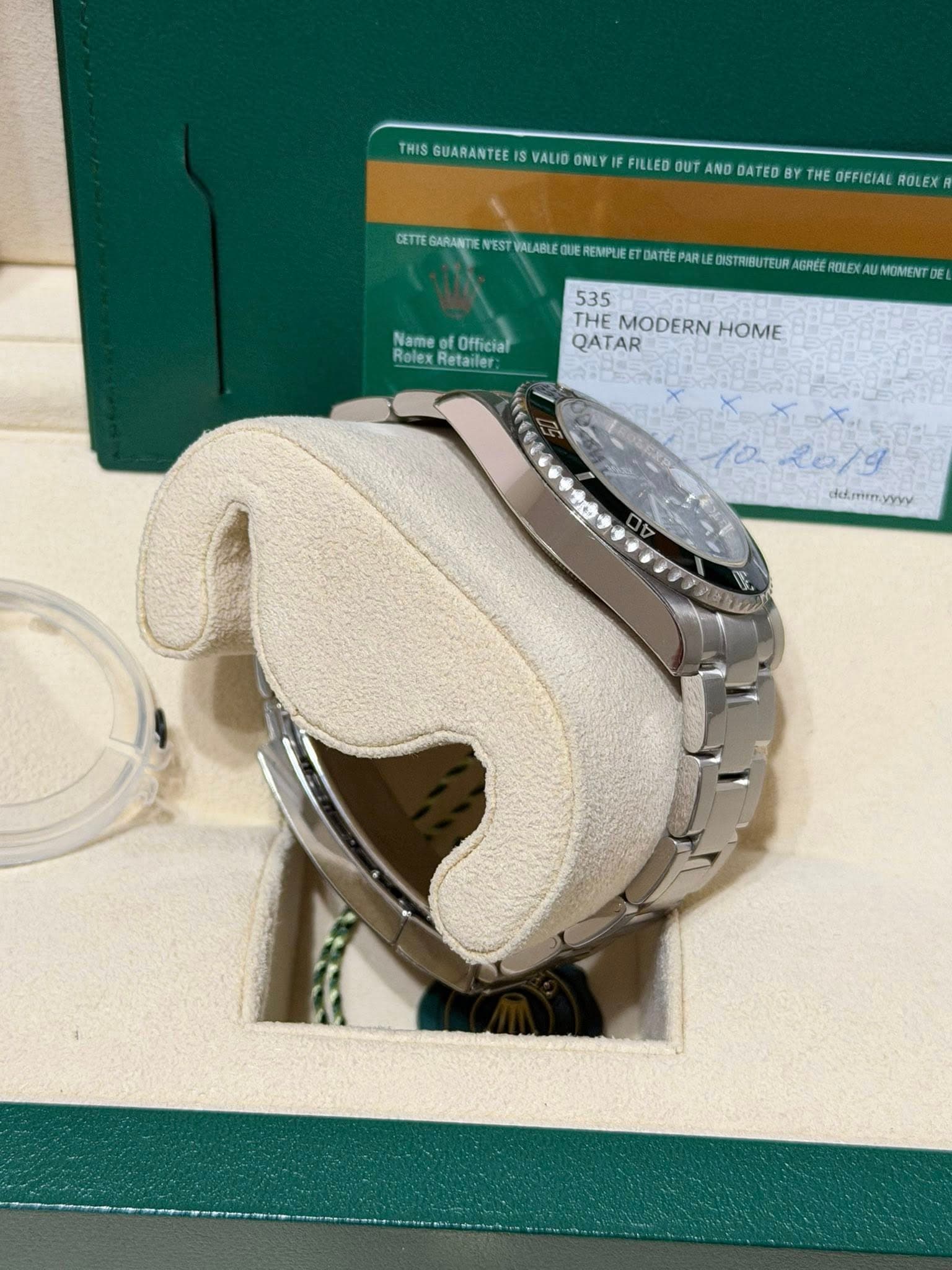 May be an image of wrist watch and text that says 'THIS GUARANTEE VALID ONLY WRATFETOAEUETETERE FF FILLED OUT ANO ΘΑΤΕO THE OFFICIAL ROLEX GETTE SARANTE EST VALABLE TF DISTRIBU Bu…
