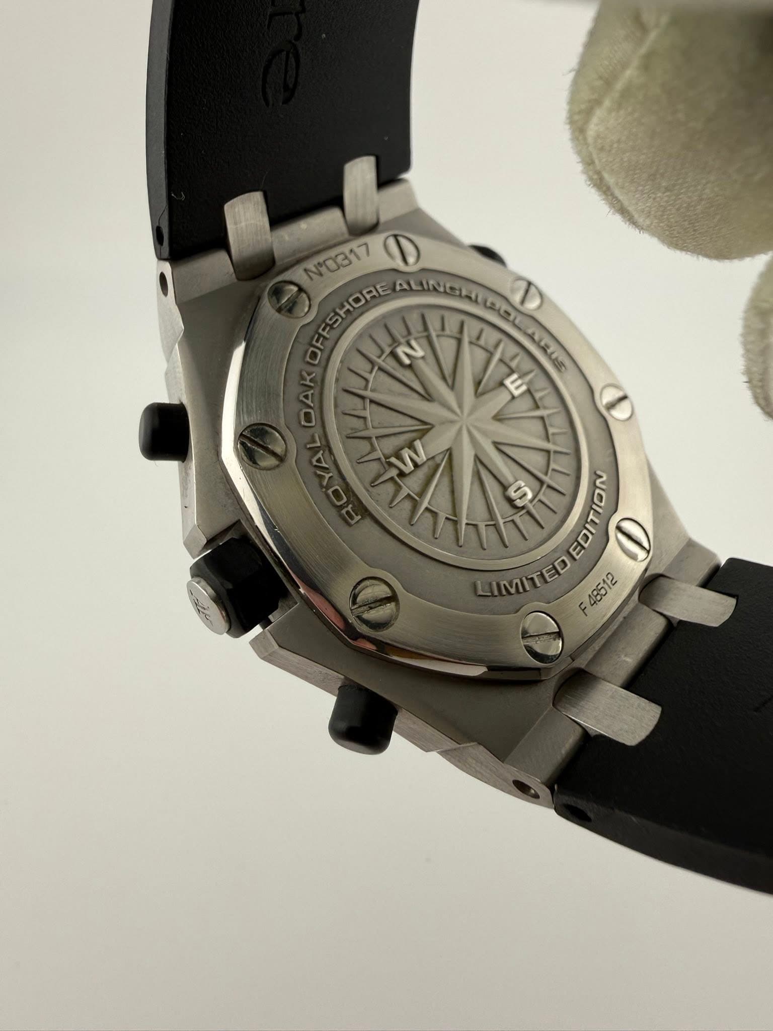 May be an image of wrist watch and text that says 'N0317 N° D ORE N ALINCALI 4 w N ග NOTTI MMITED MMI D F 48512'