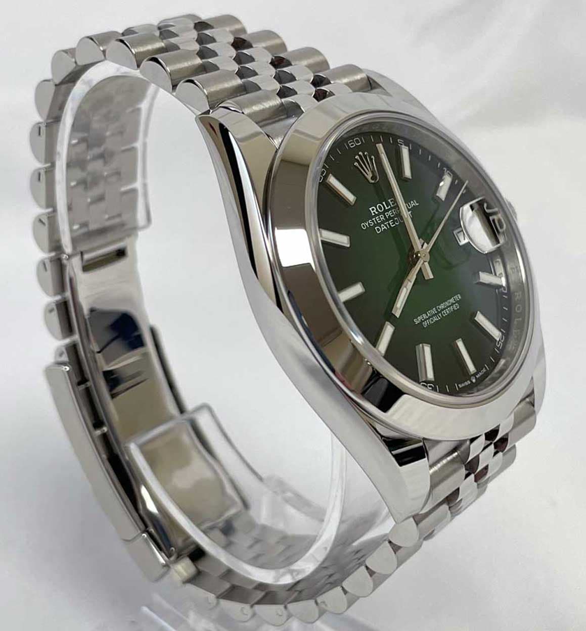 May be an image of wrist watch and text that says 'Q0 00 ROLE UAL OYST YSTERPE YSTERPE DAT DATE CULE TERPER E JE ភលម CC'