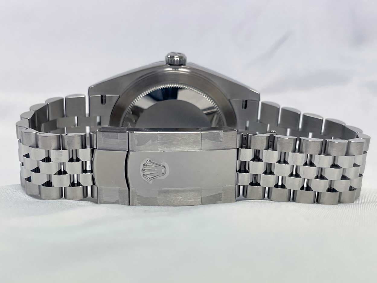 May be an image of wrist watch