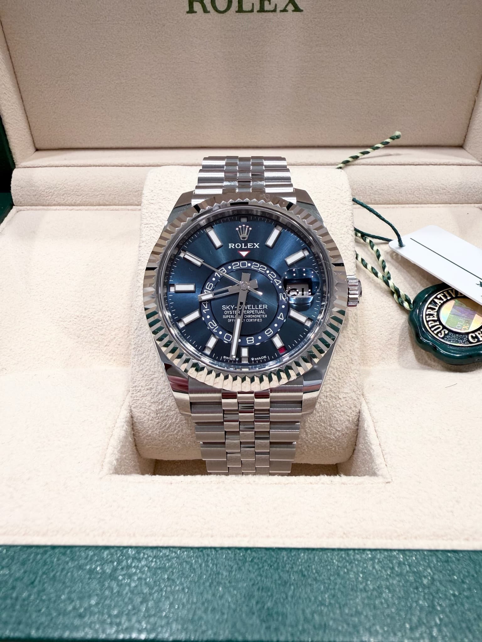 May be an image of wrist watch and text