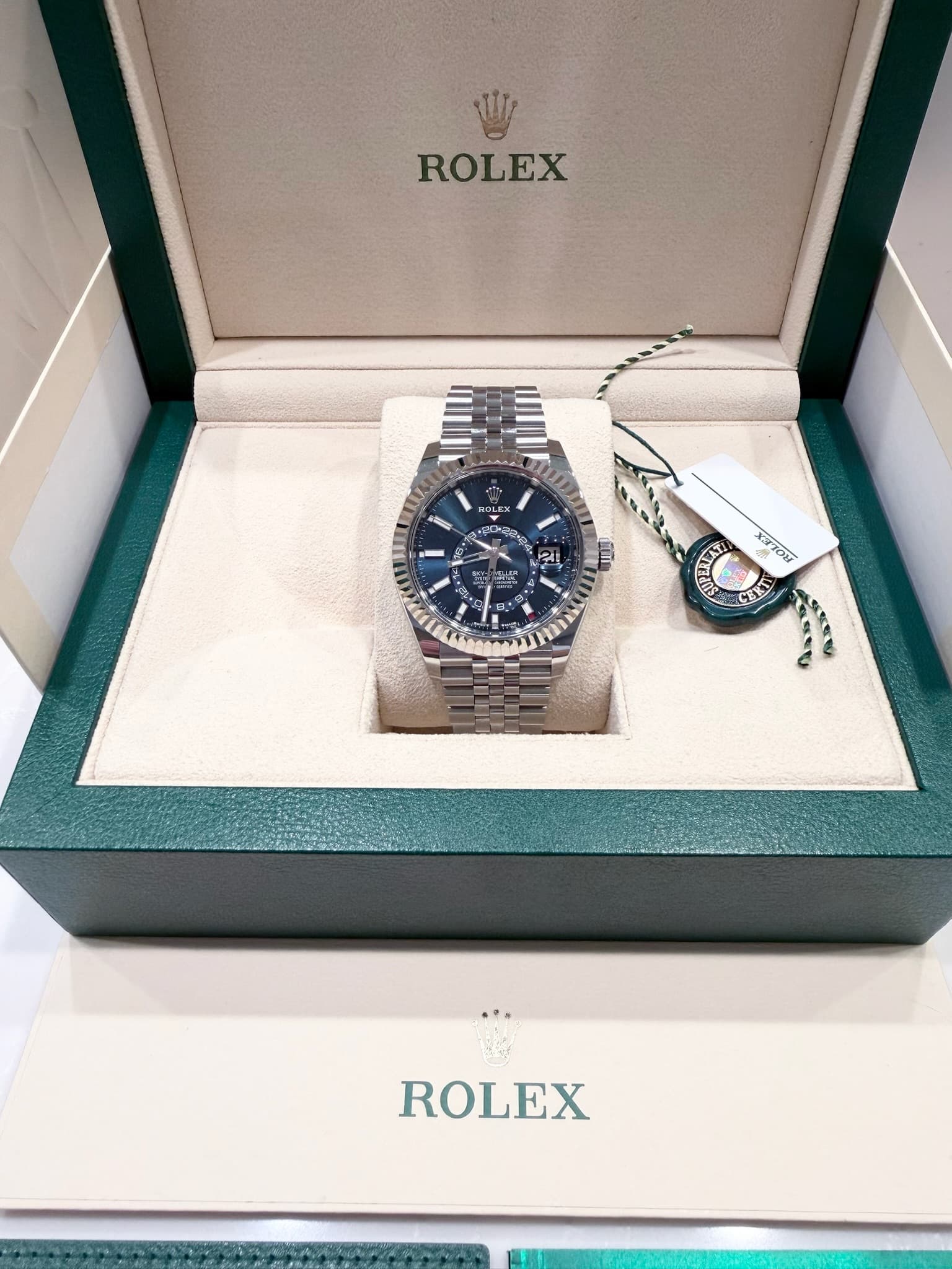 May be an image of wrist watch and text