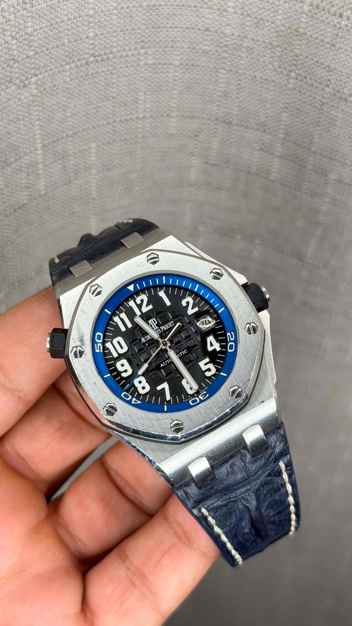 May be an image of wrist watch and text