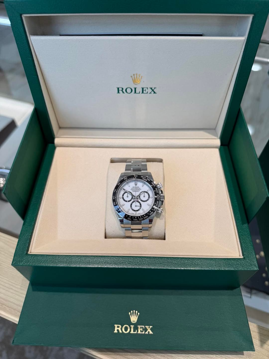 May be an image of wrist watch and text