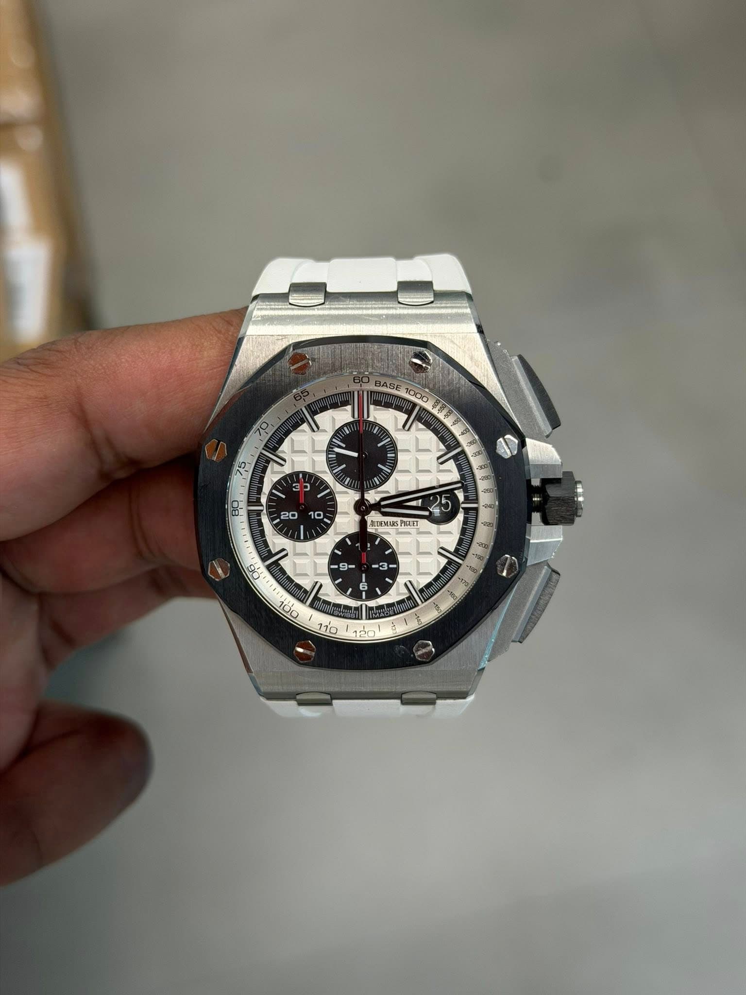 May be an image of wrist watch and text