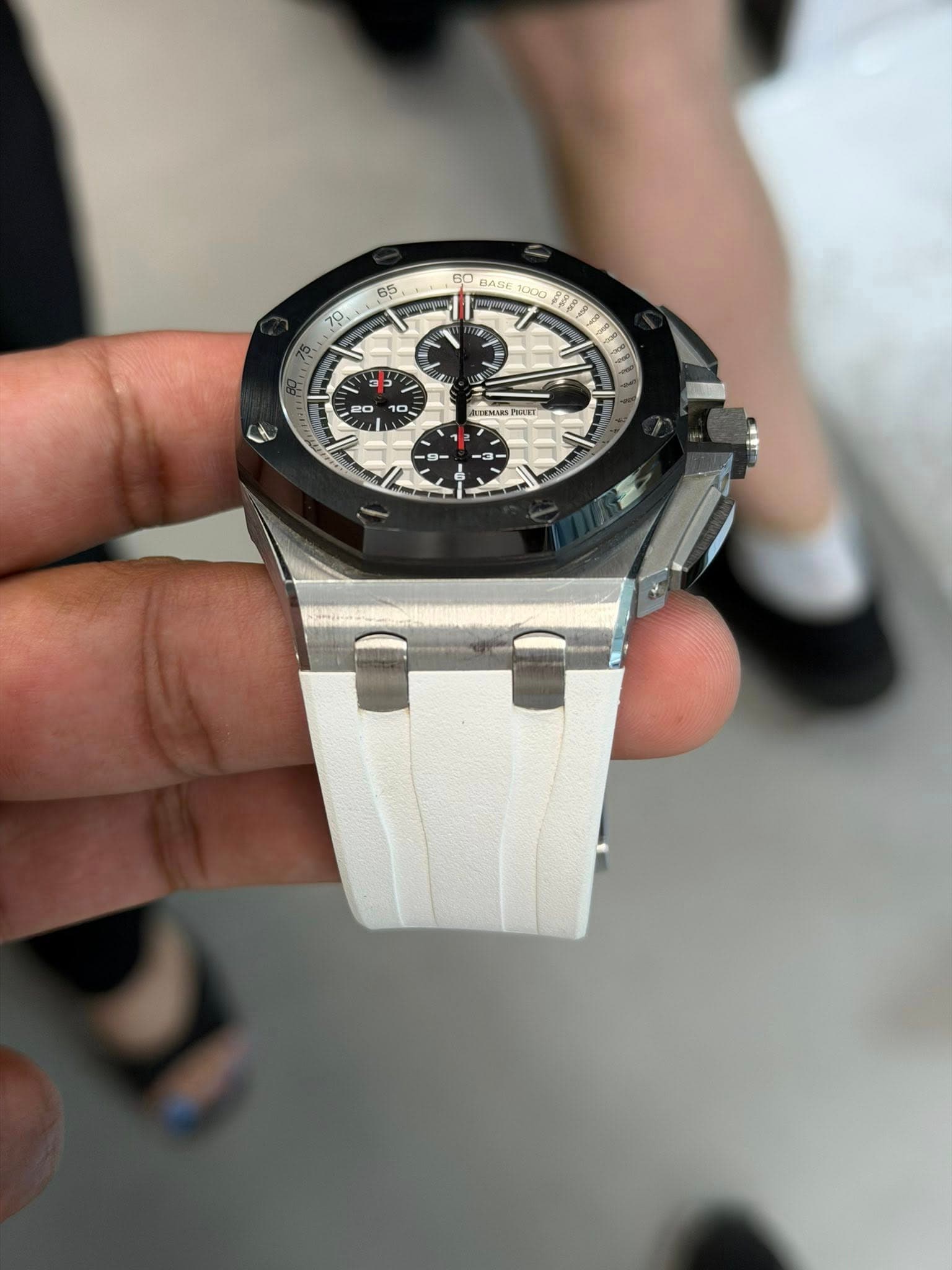 May be an image of wrist watch and text
