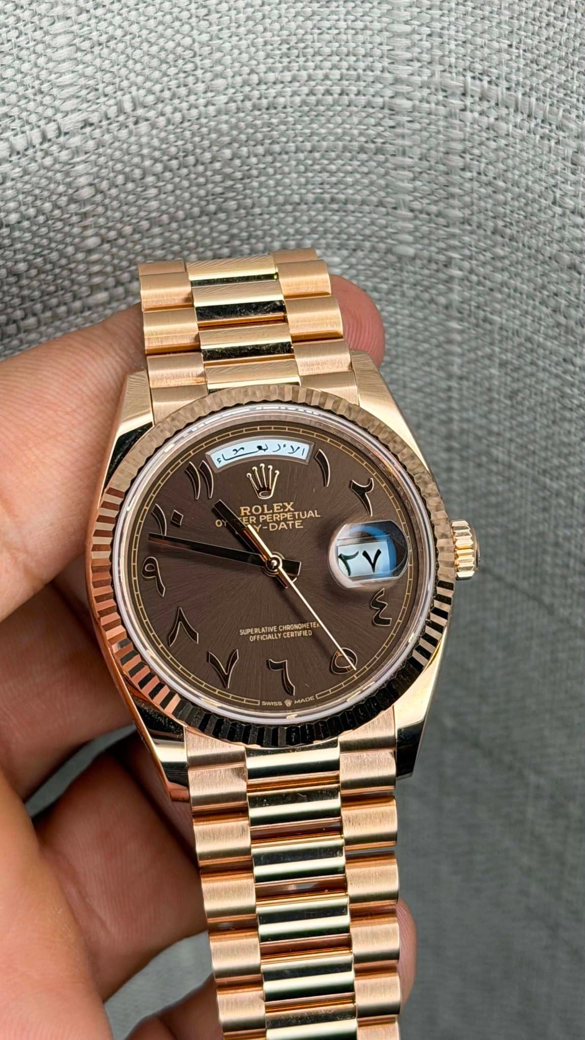 May be an image of wrist watch and text