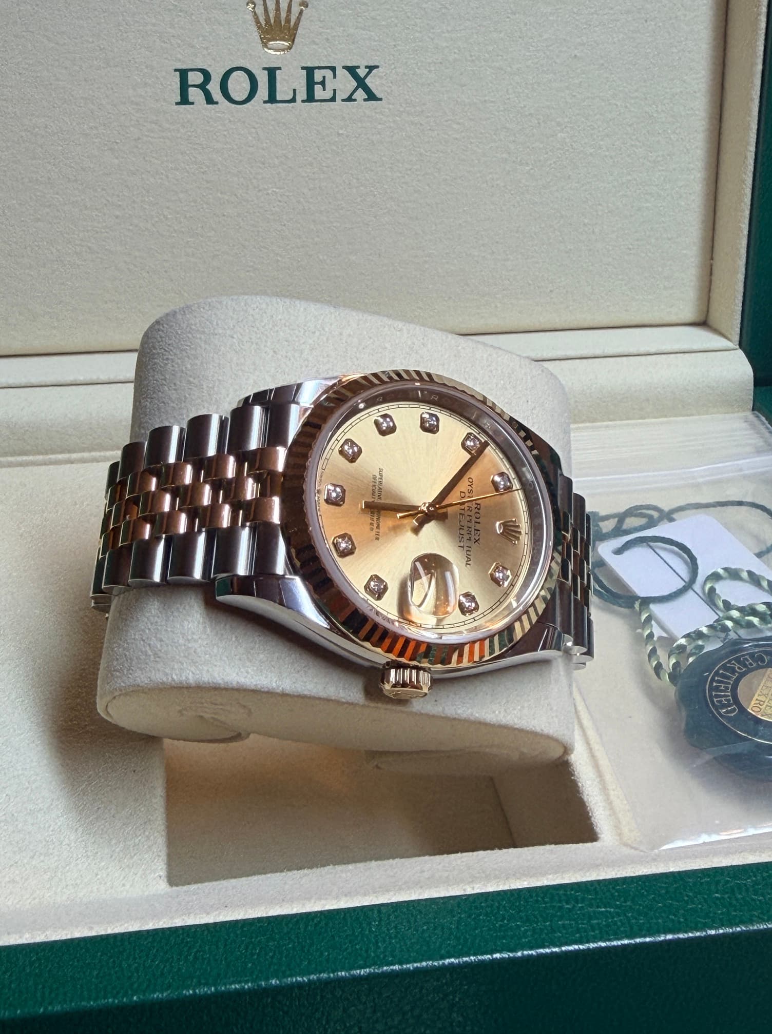 May be an image of wrist watch and text