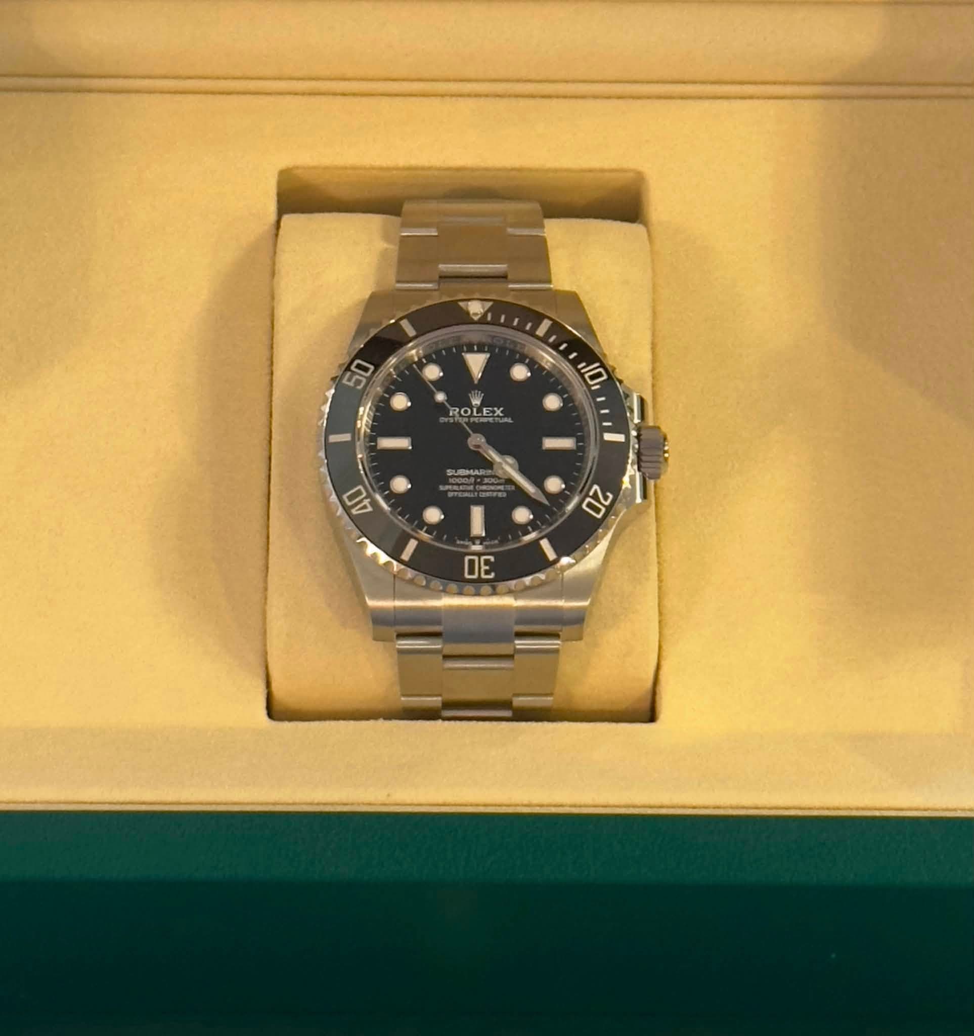 May be an image of wrist watch and text that says '50 T 10 RO ROLEX LEX '