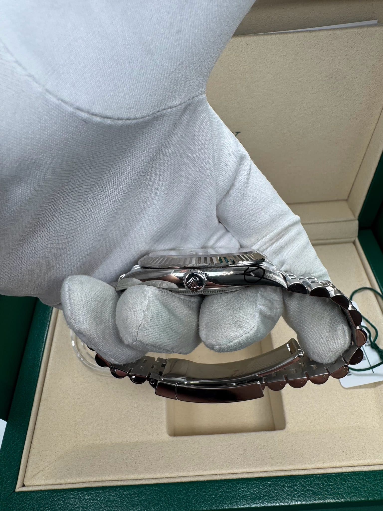 May be an image of wrist watch and knife
