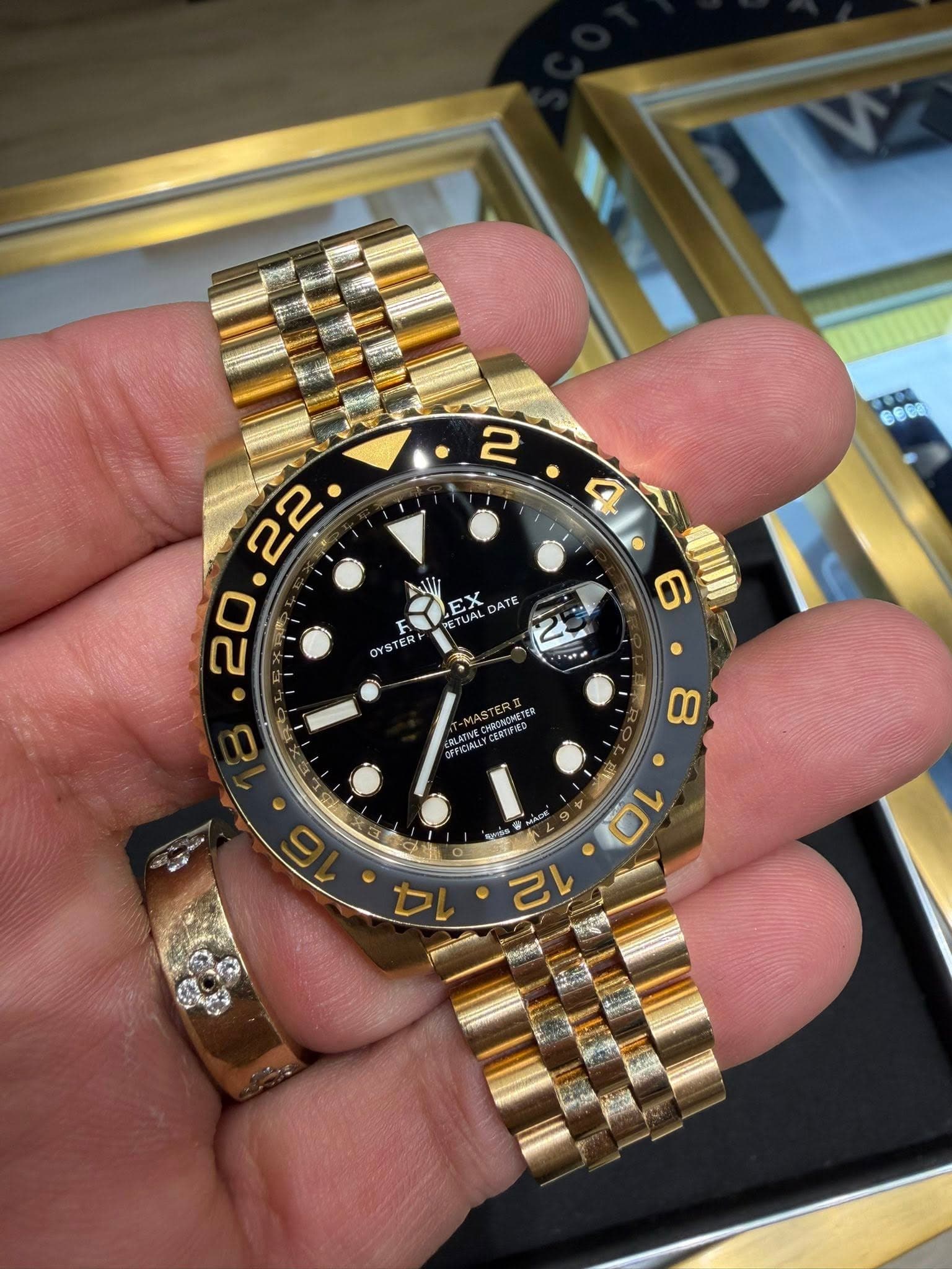 May be an image of wrist watch and text