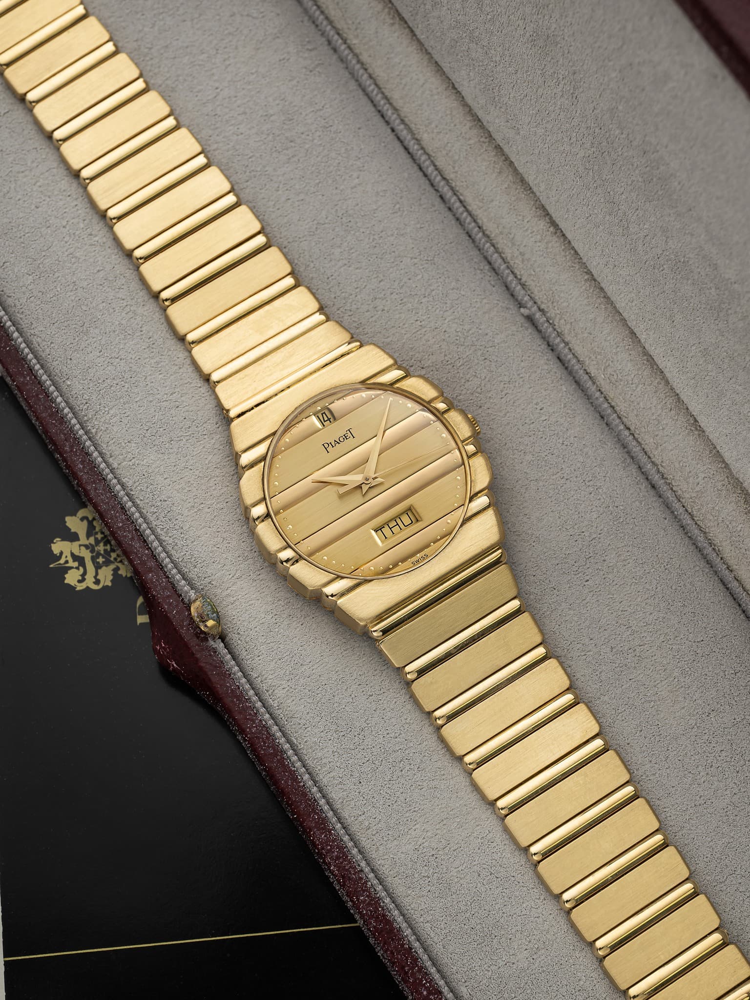 May be an image of wrist watch and text