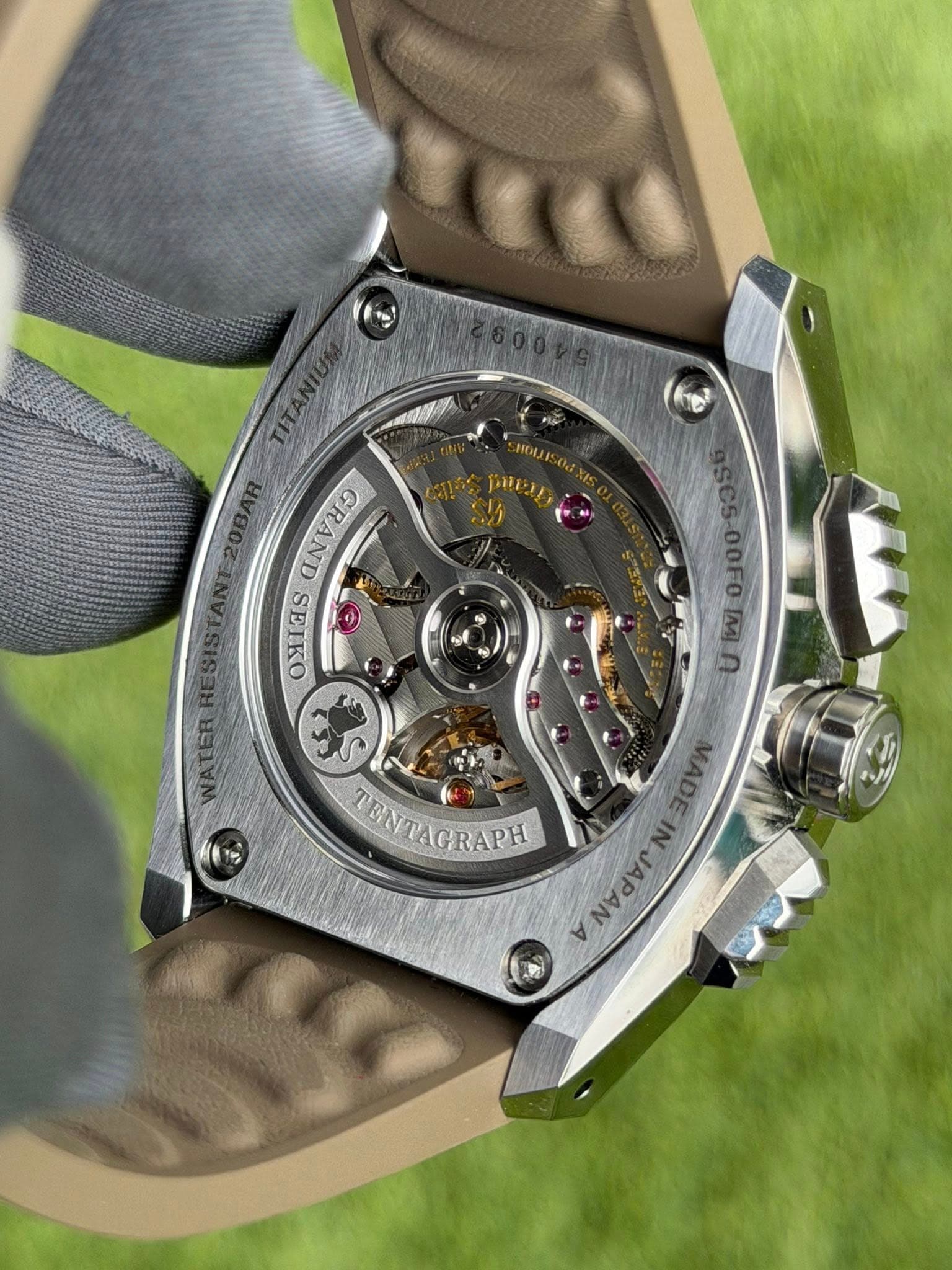 May be an image of wrist watch and text