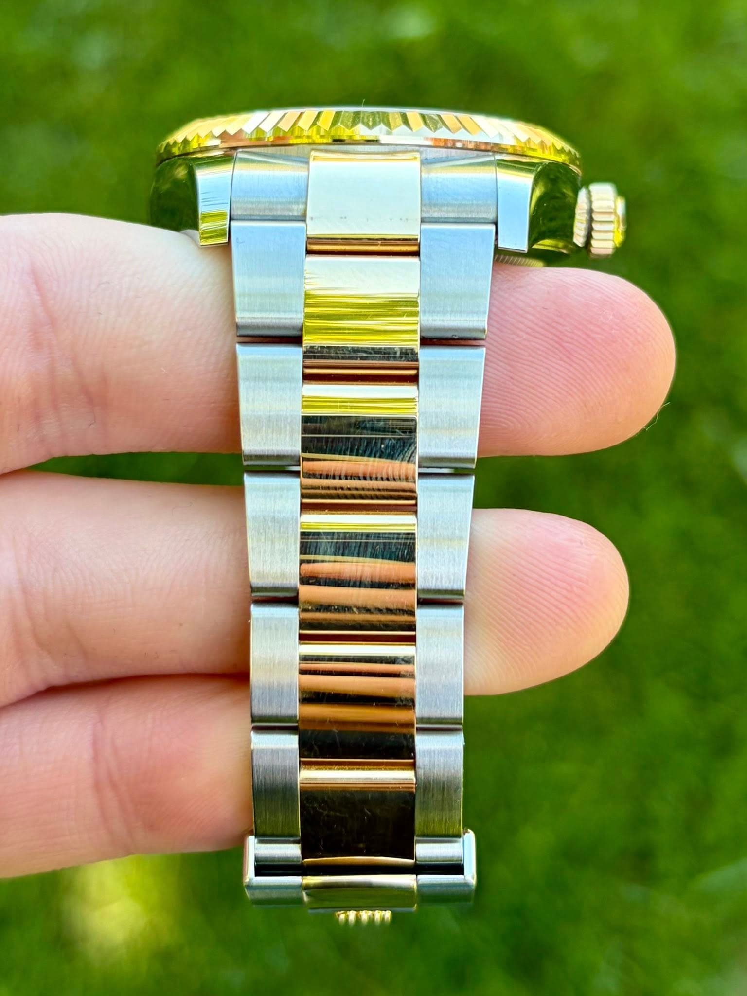 May be an image of wrist watch