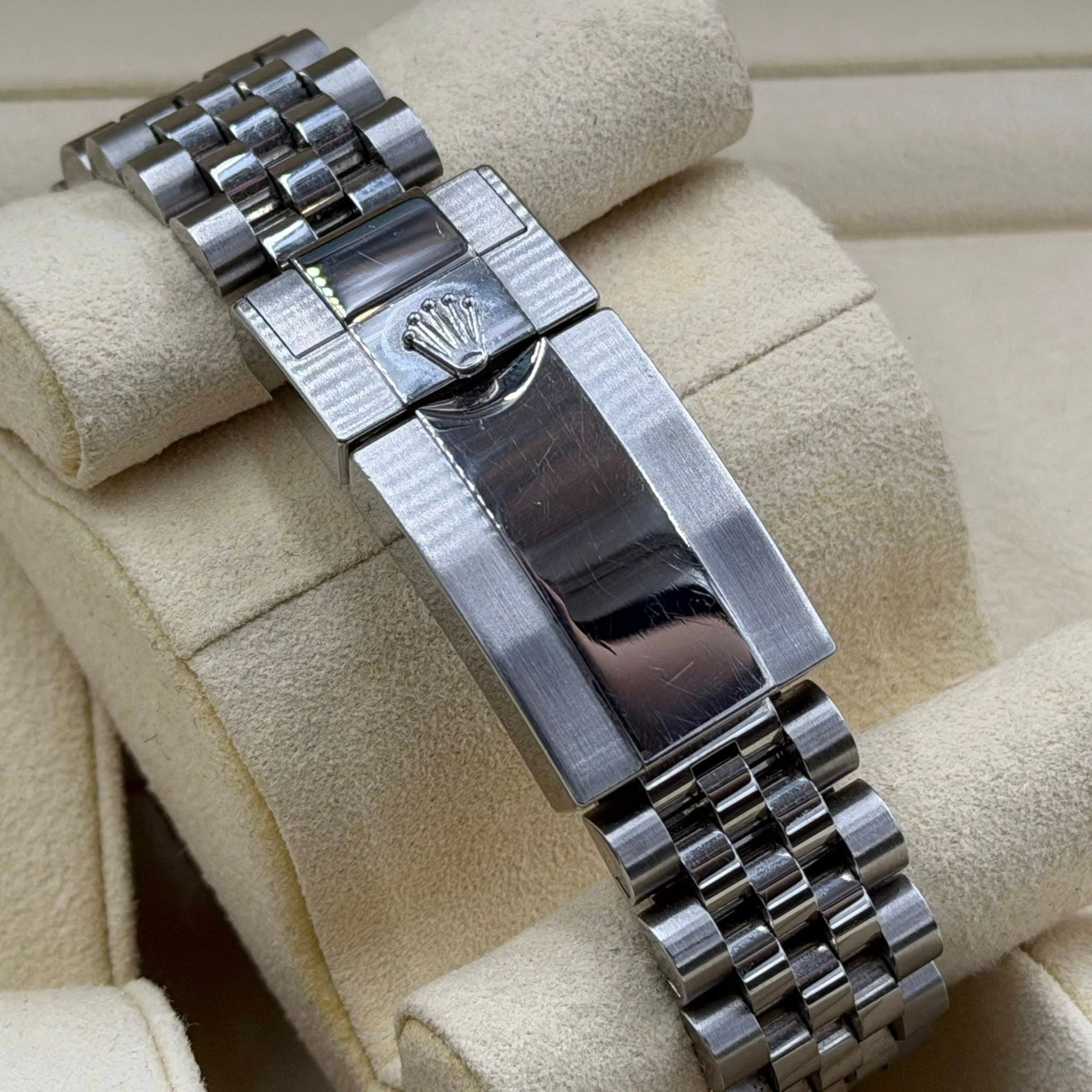 May be an image of wrist watch