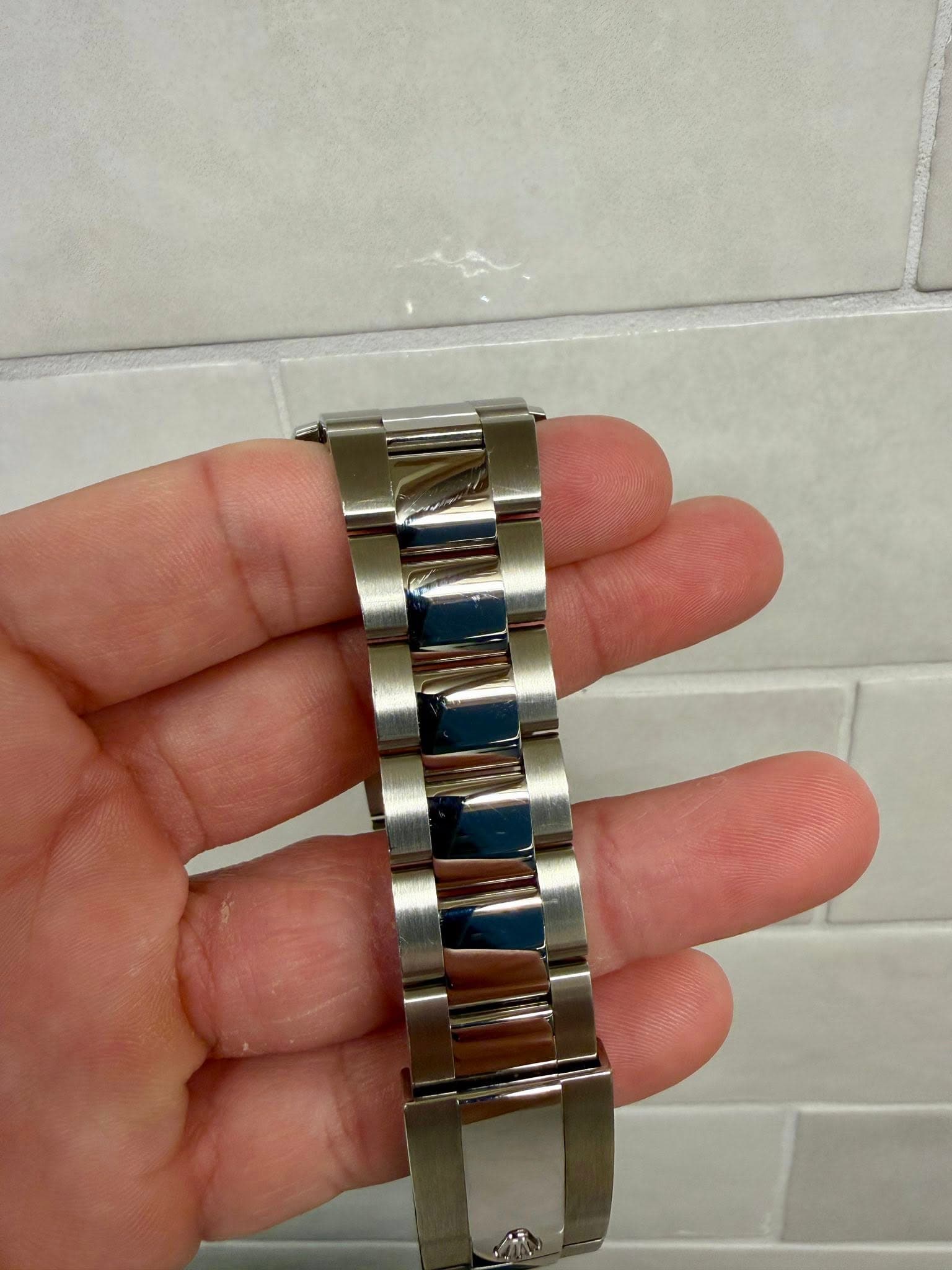 May be an image of wrist watch