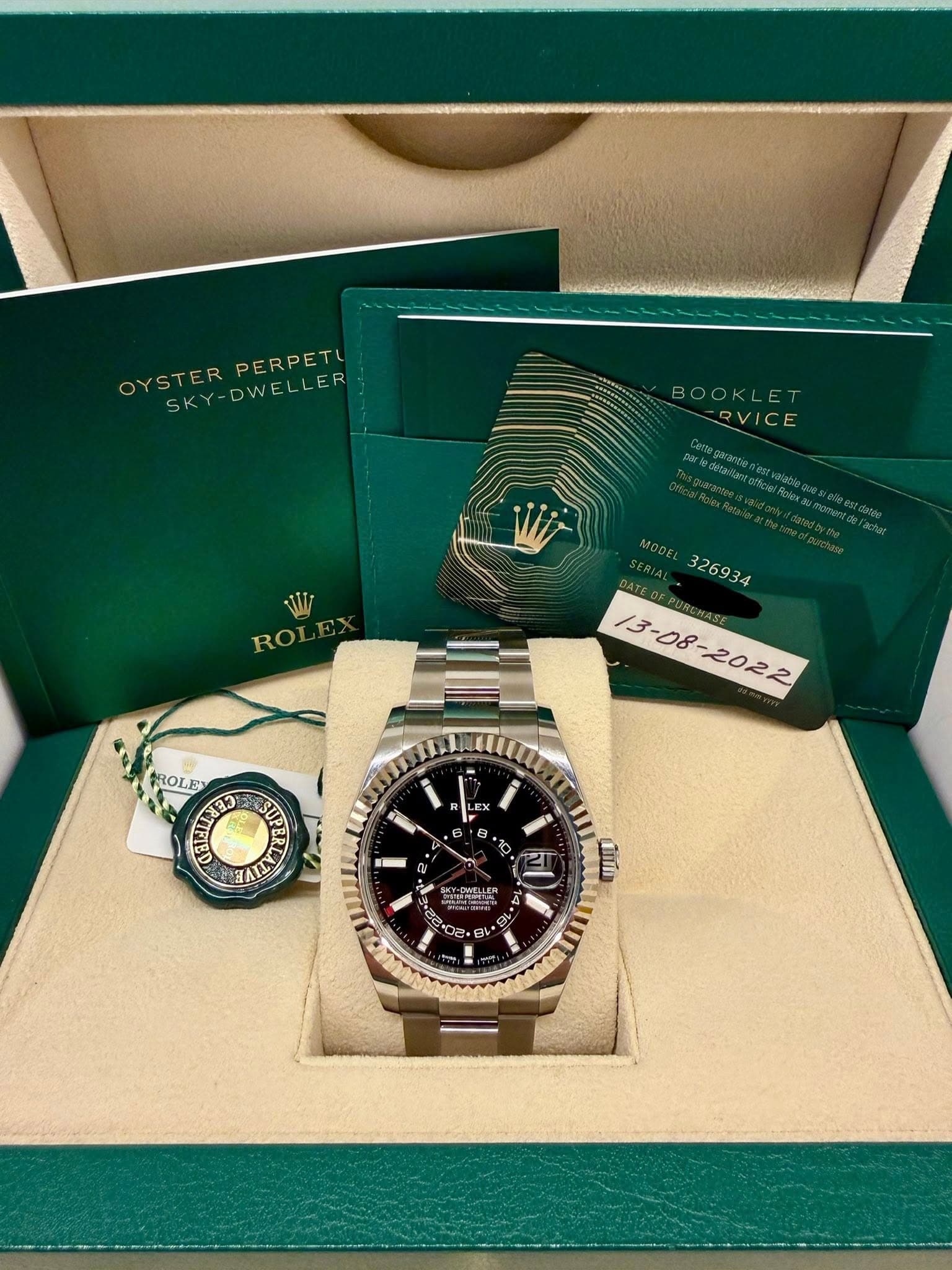 May be an image of wrist watch and text