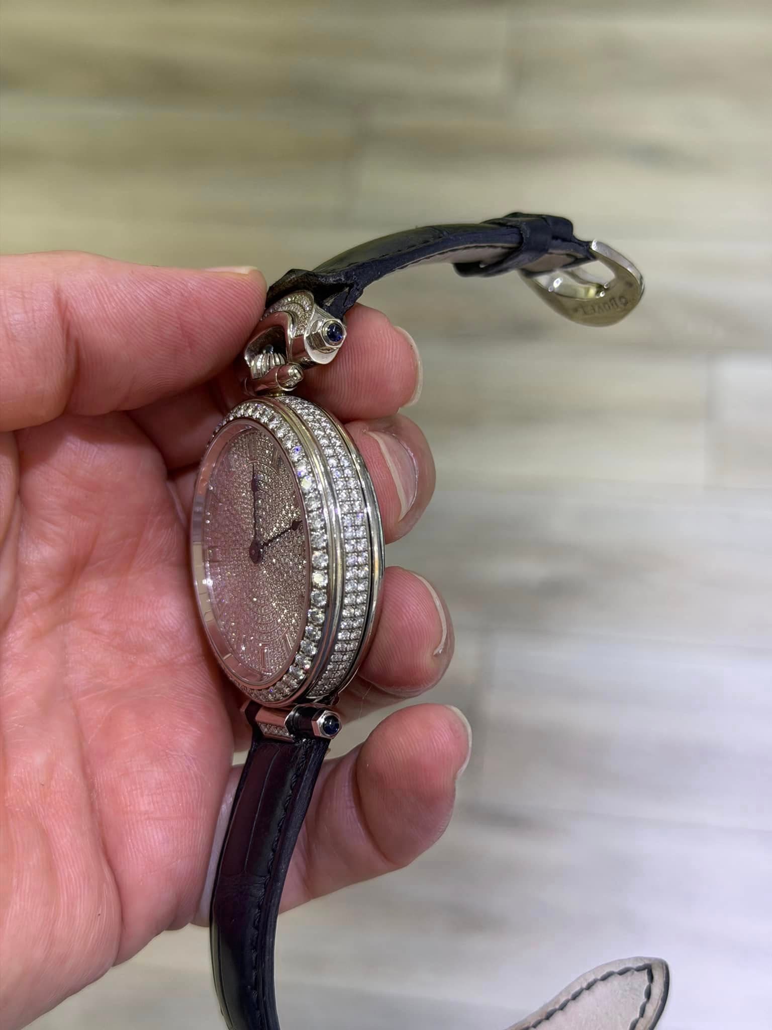 May be an image of wrist watch