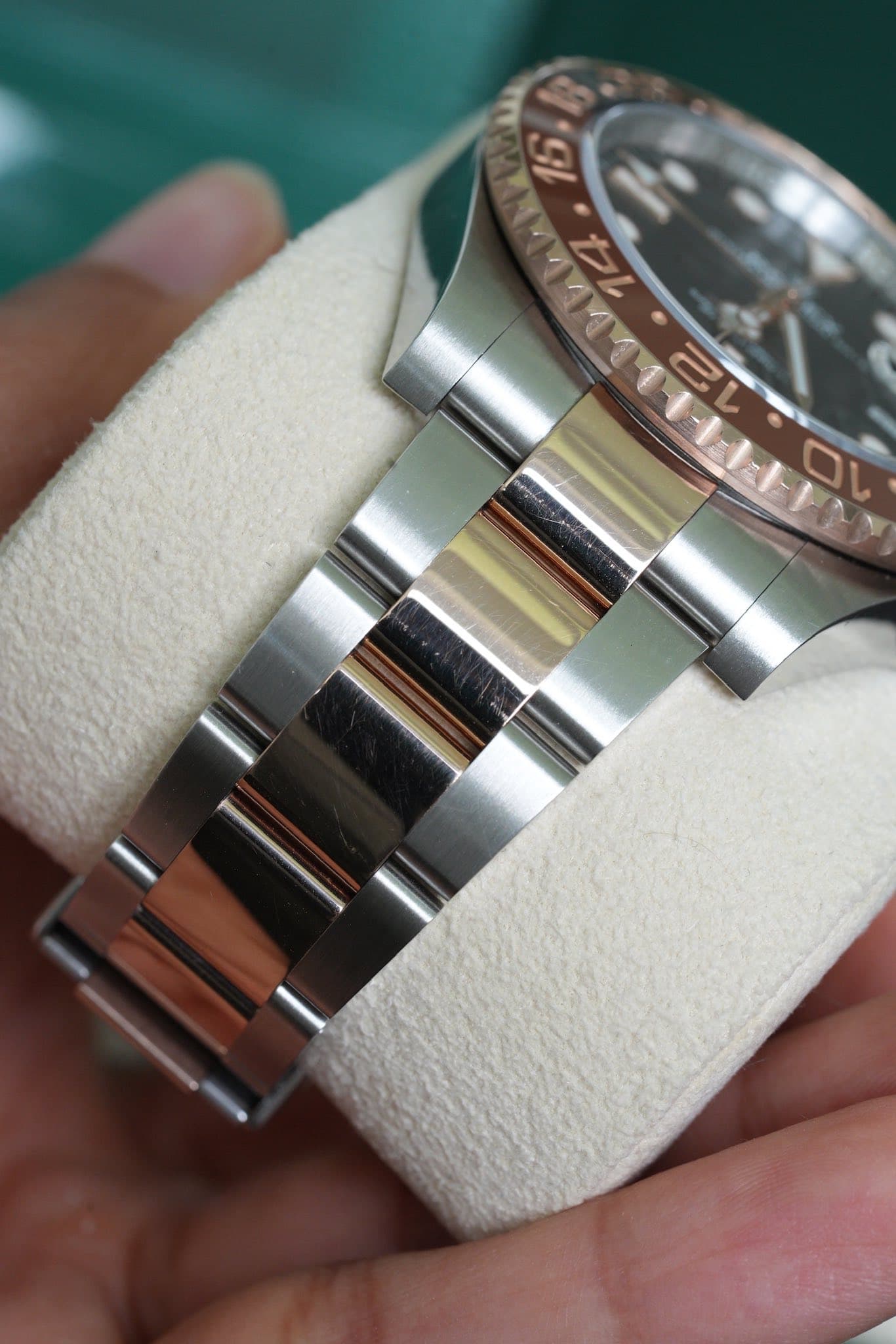 May be an image of wrist watch and text