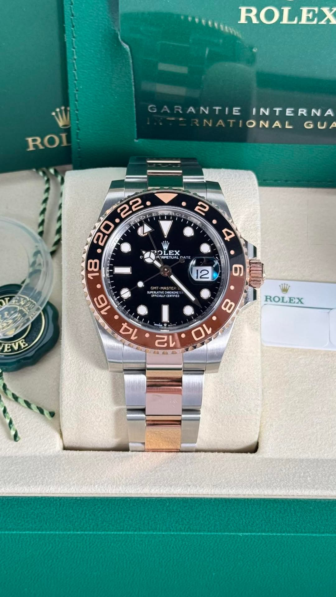 May be an image of wrist watch and text