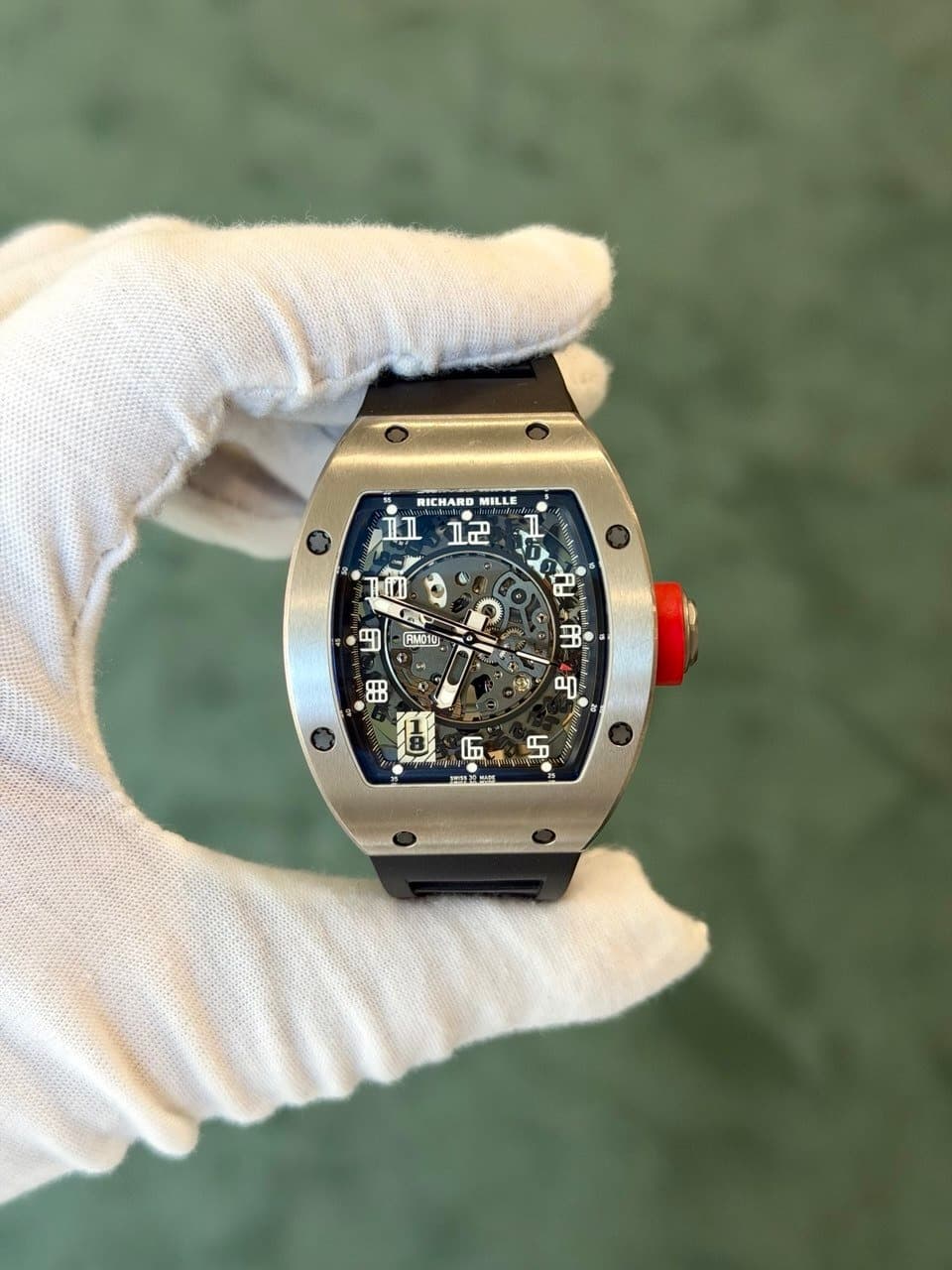 May be an image of wrist watch and text