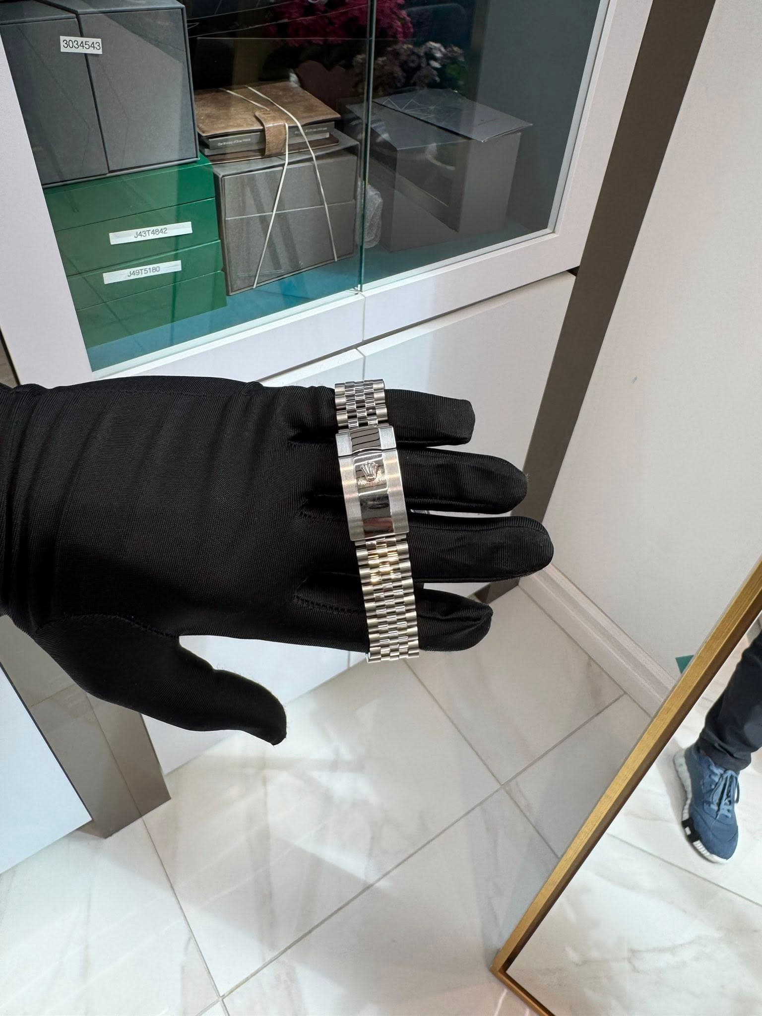 May be an image of jewelry and wrist watch
