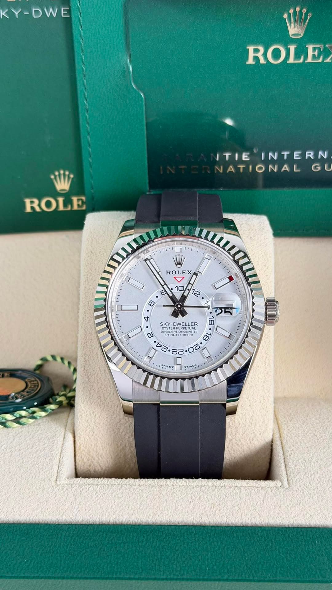 May be an image of wrist watch and text