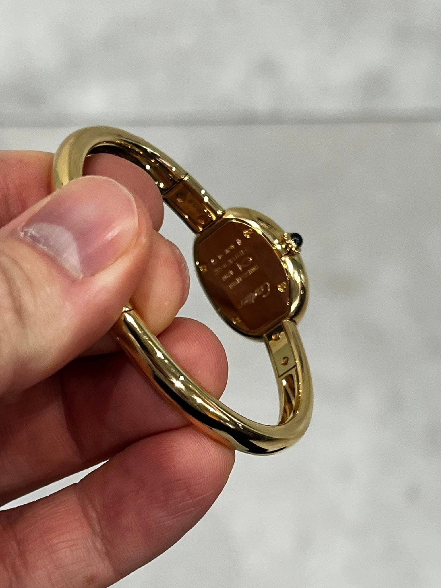 May be an image of brass and jewelry