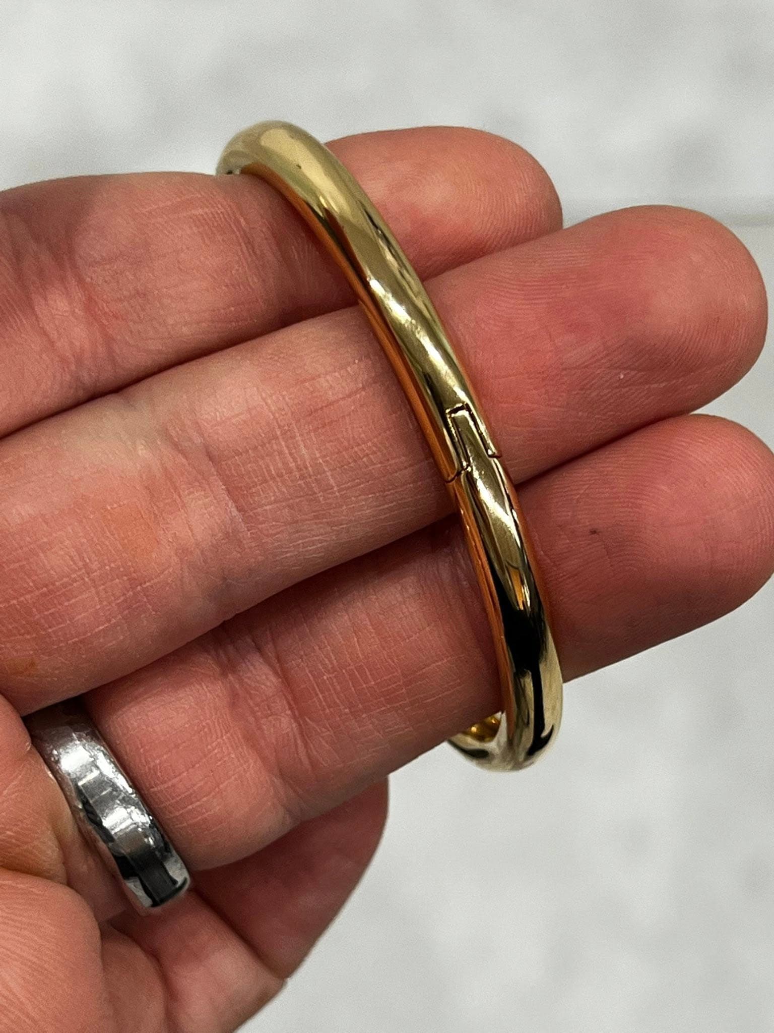 May be an image of brass and jewelry
