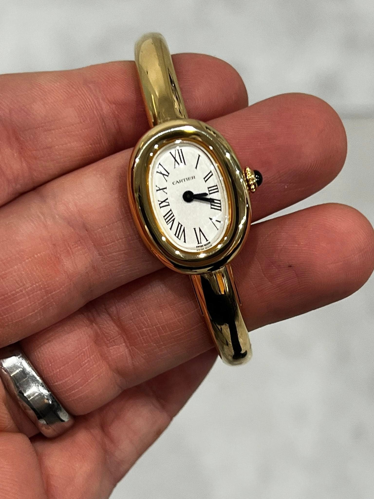 May be an image of wrist watch