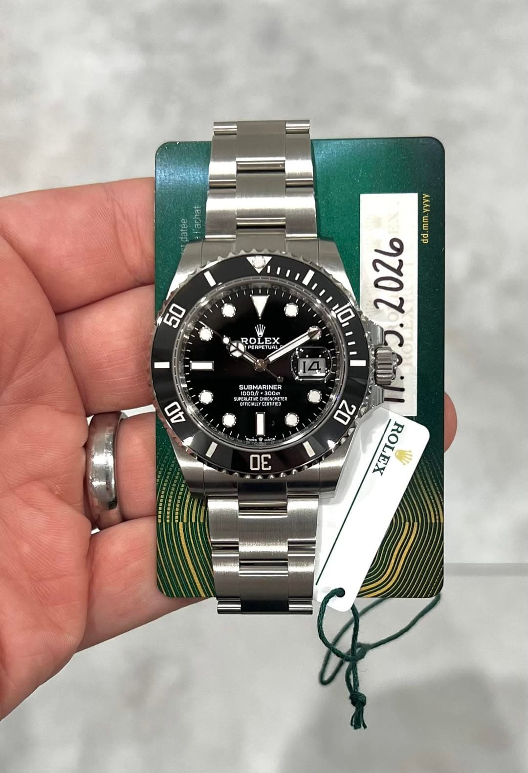 May be an image of wrist watch and text