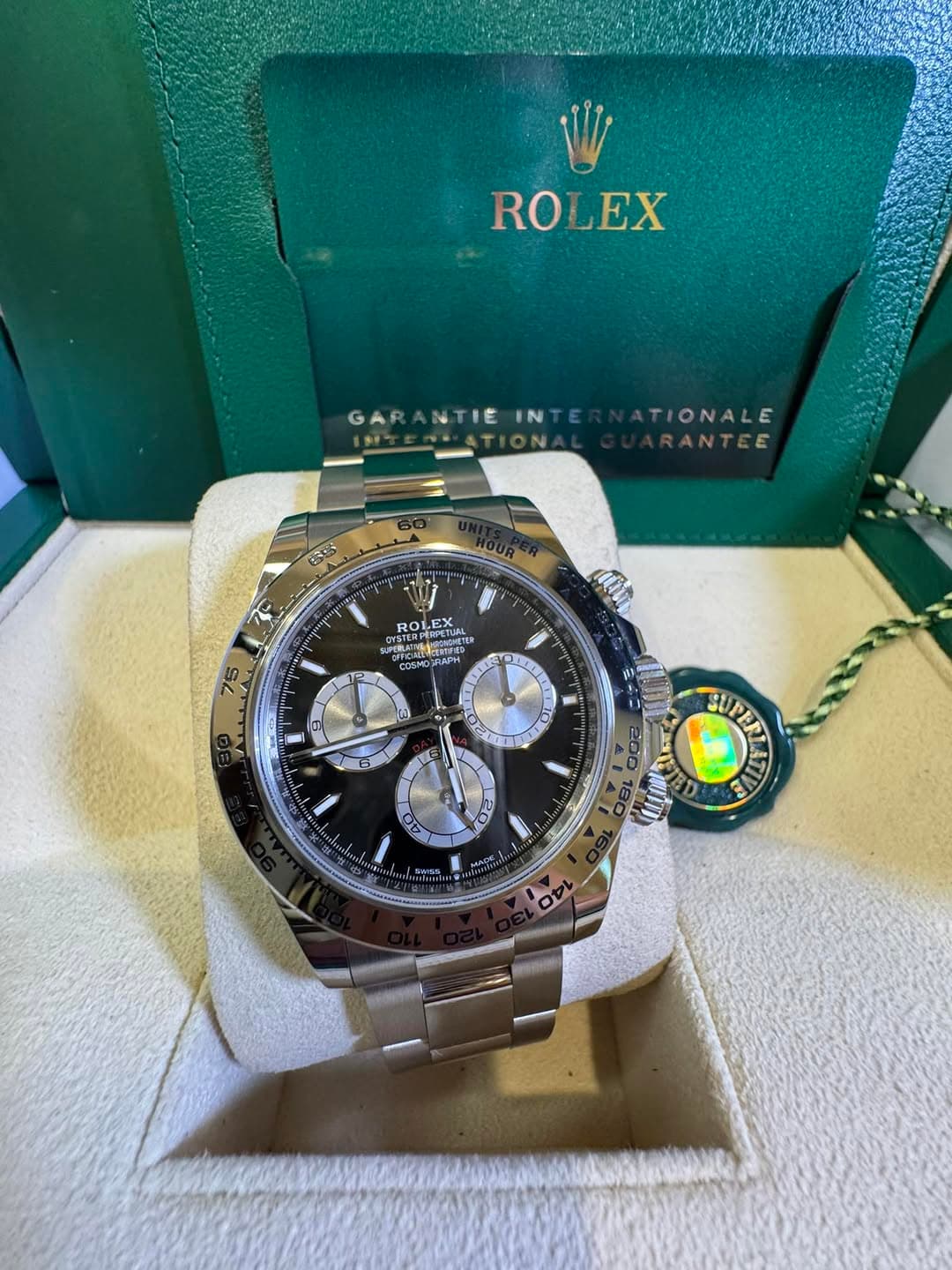 May be an image of wrist watch and text