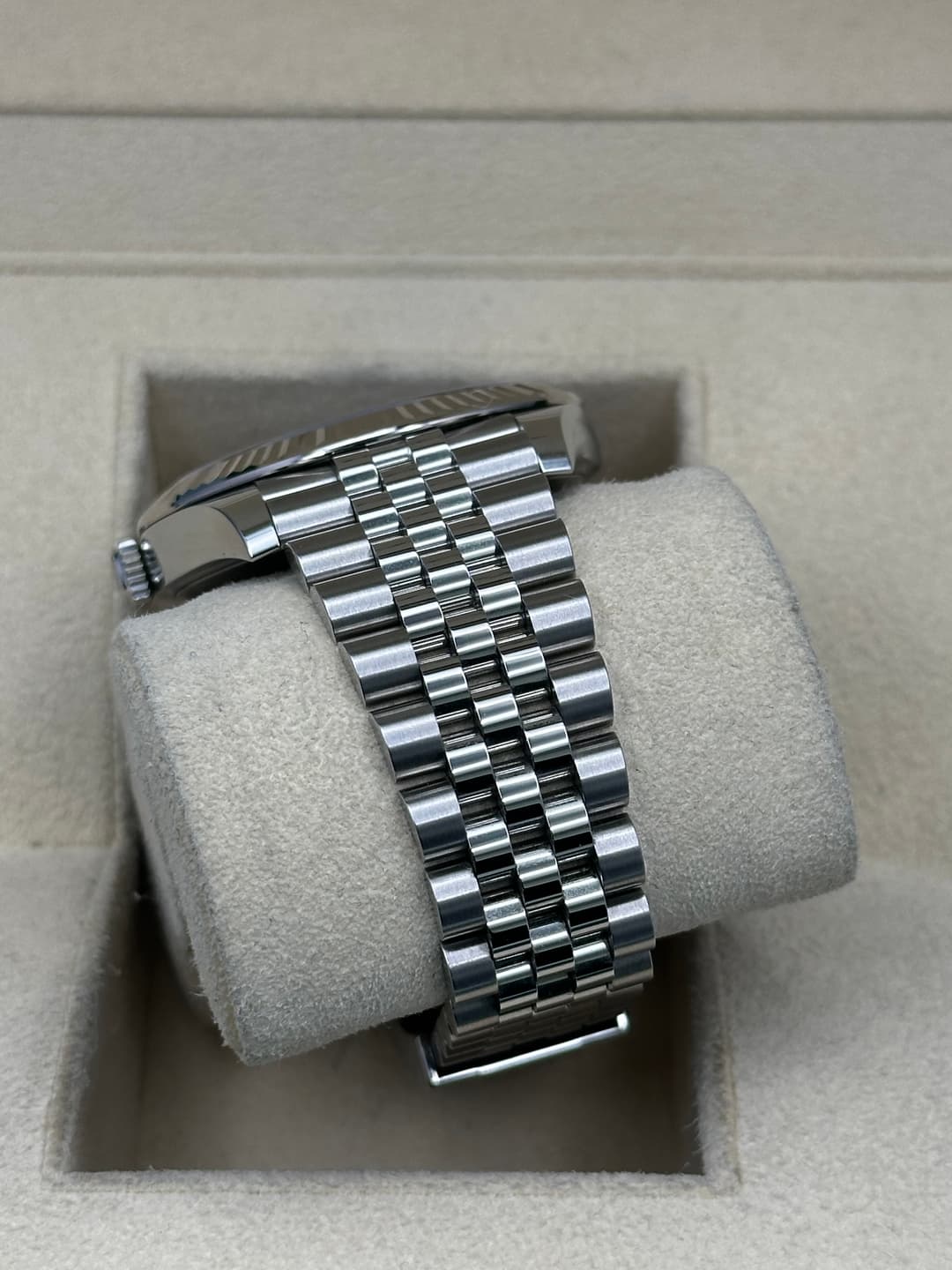 May be an image of wrist watch and text